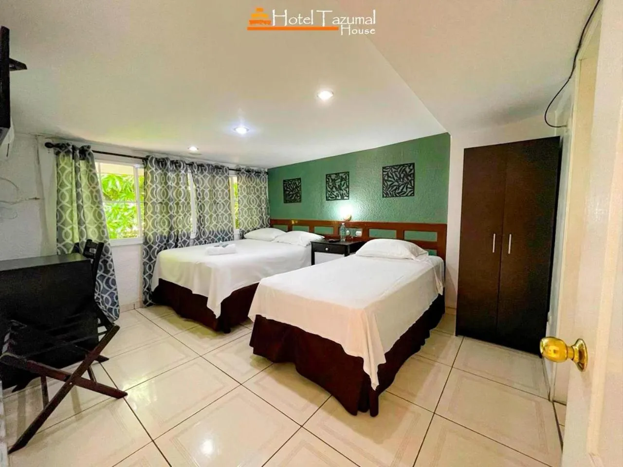 Bed in Hotel Tazumal House