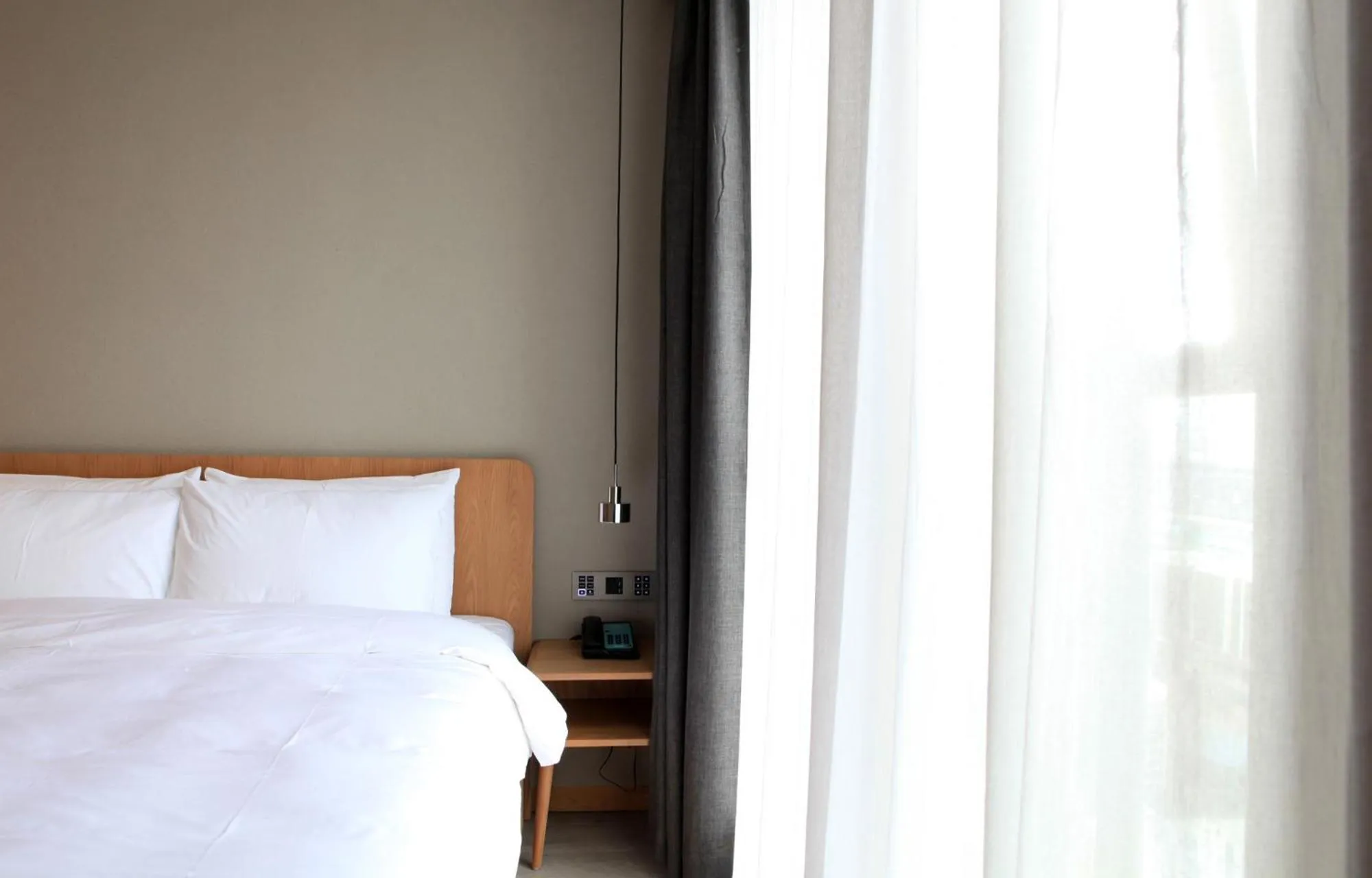 Bedroom, Bed in EBO Hotel Hangzhou Wulin - 5 mins drive to the West Lake