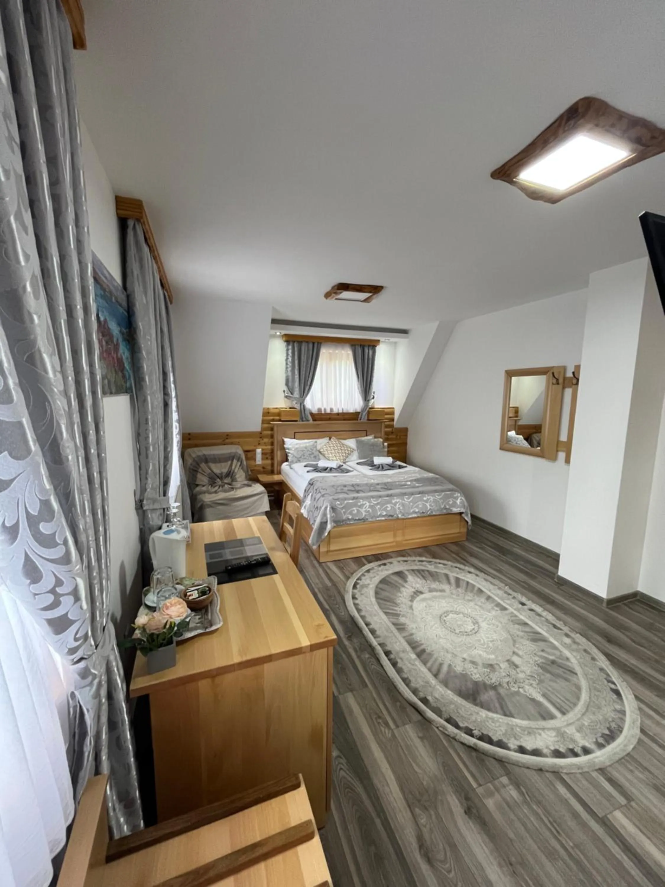 Bed in Rustic Inn River