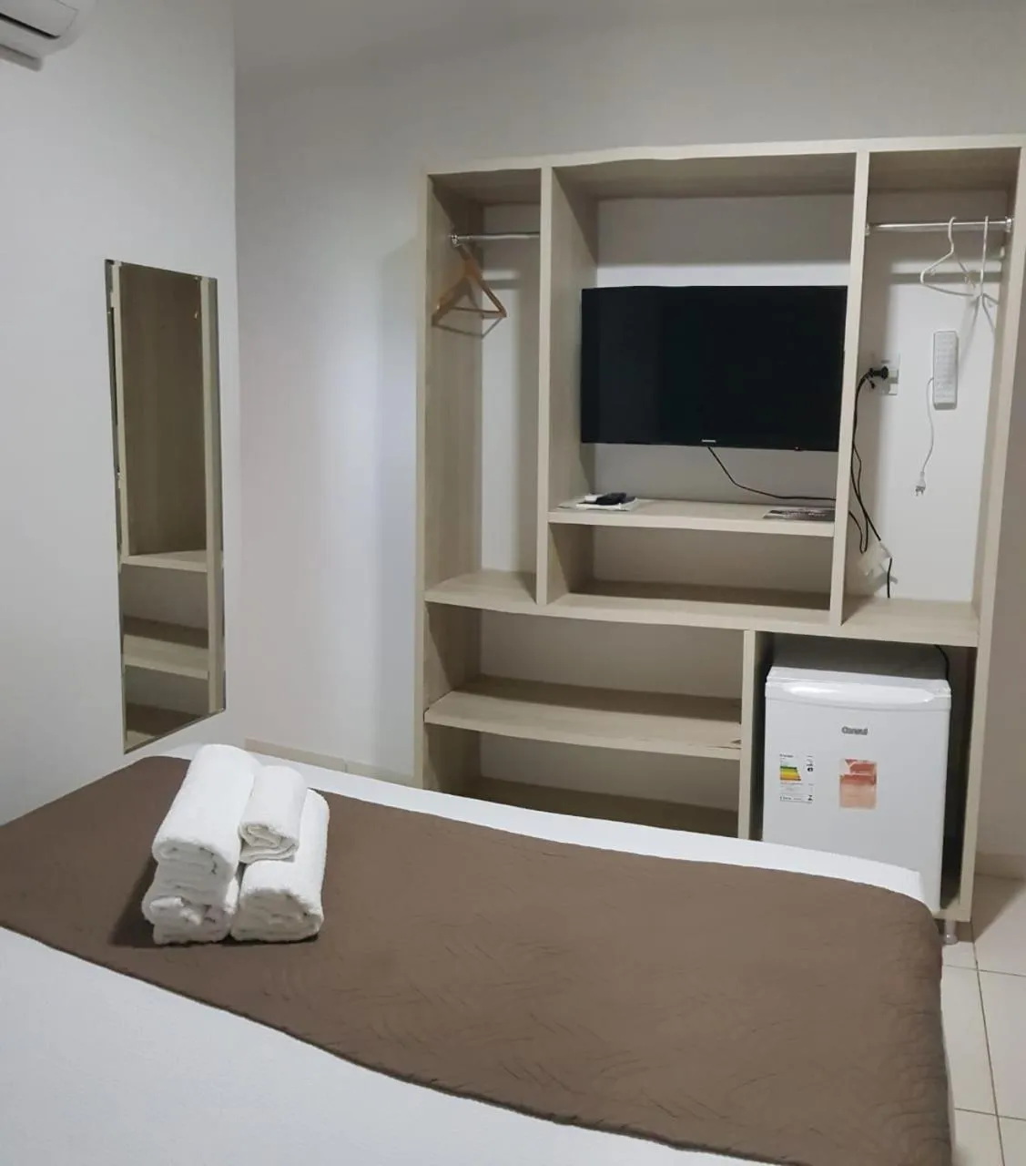 Bed in Pousada Maragolfinho