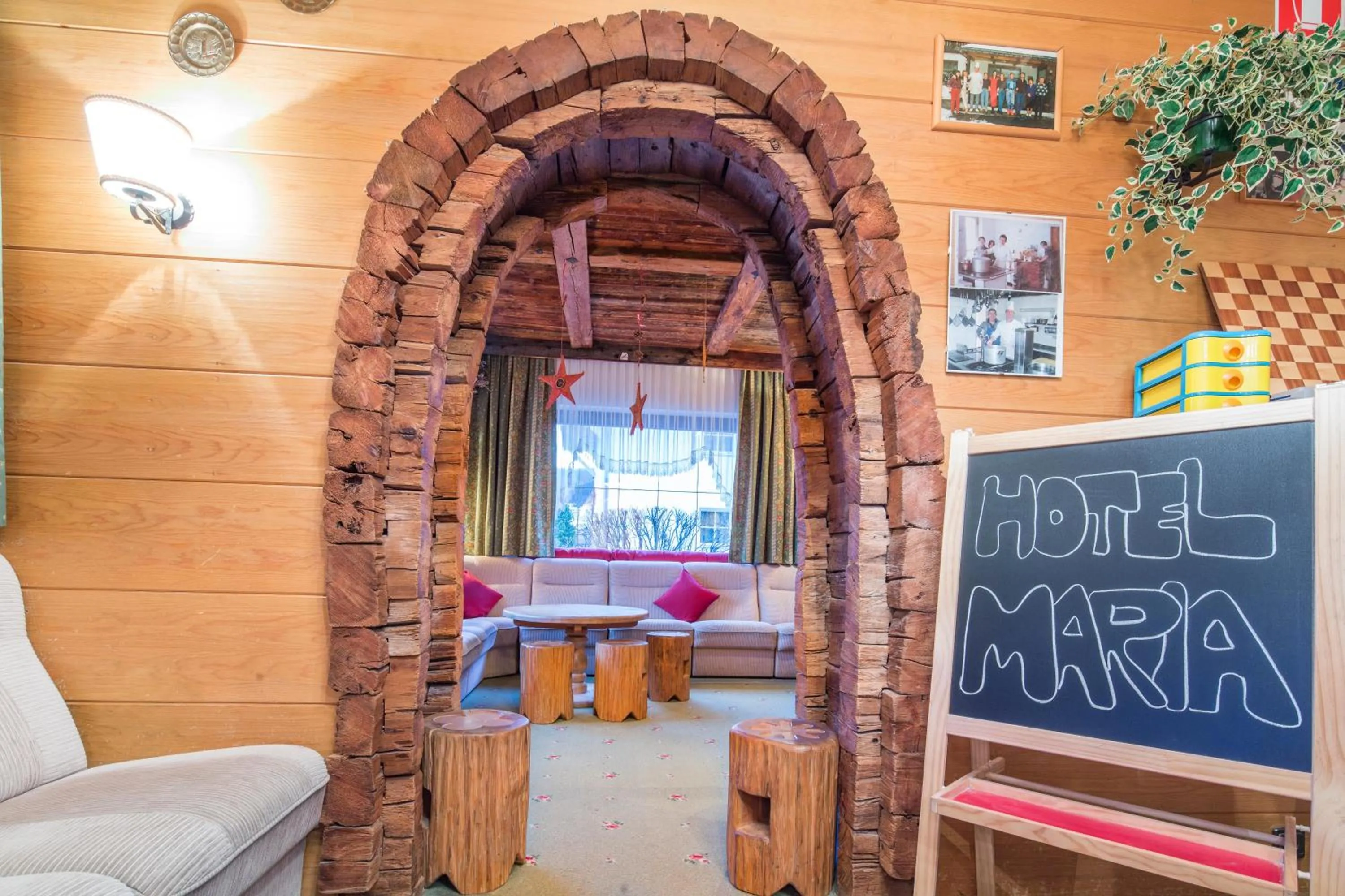 Communal lounge/ TV room in Hotel Maria