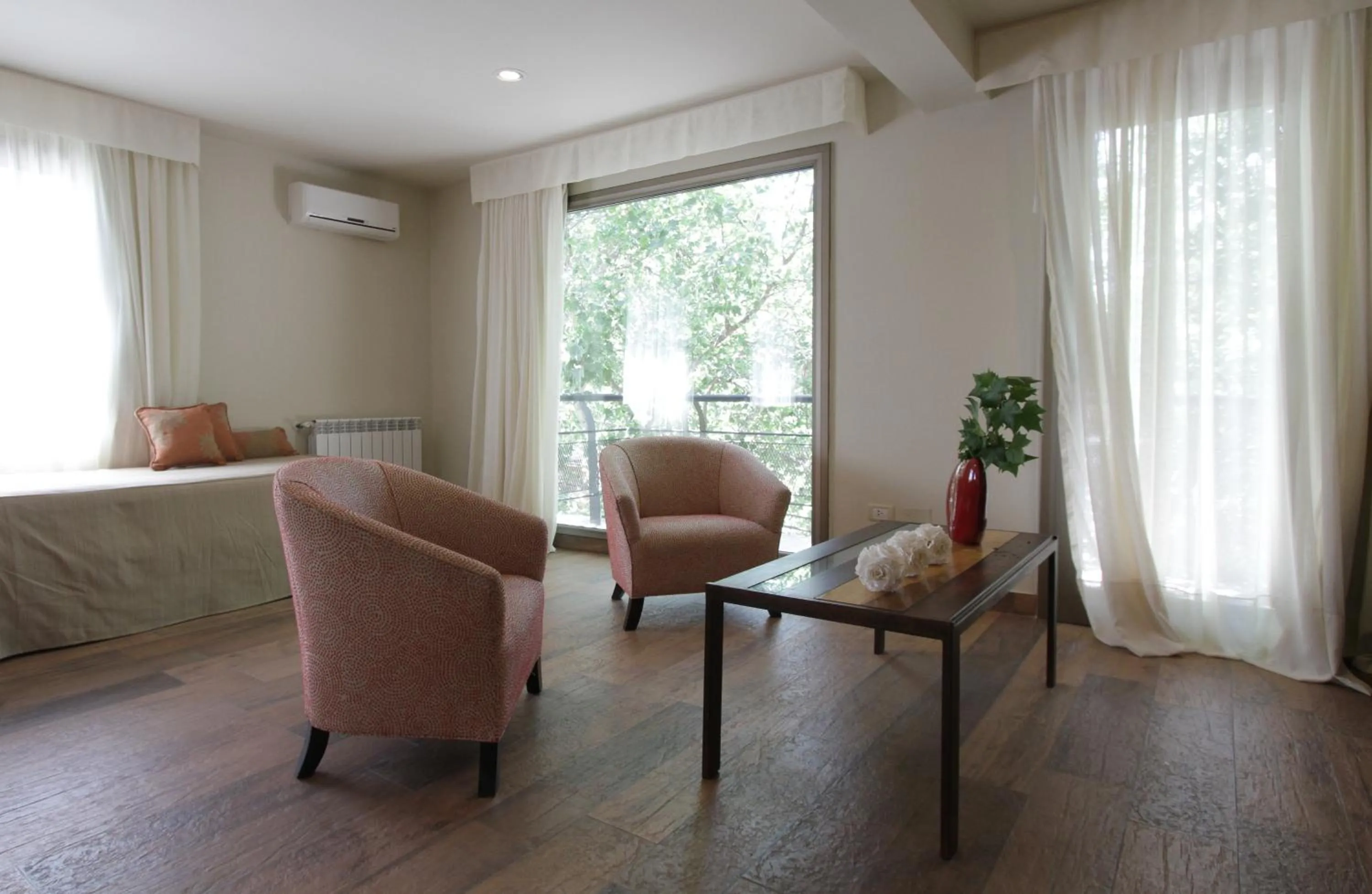 Seating area in Plaza Paradiso Petit Hotel