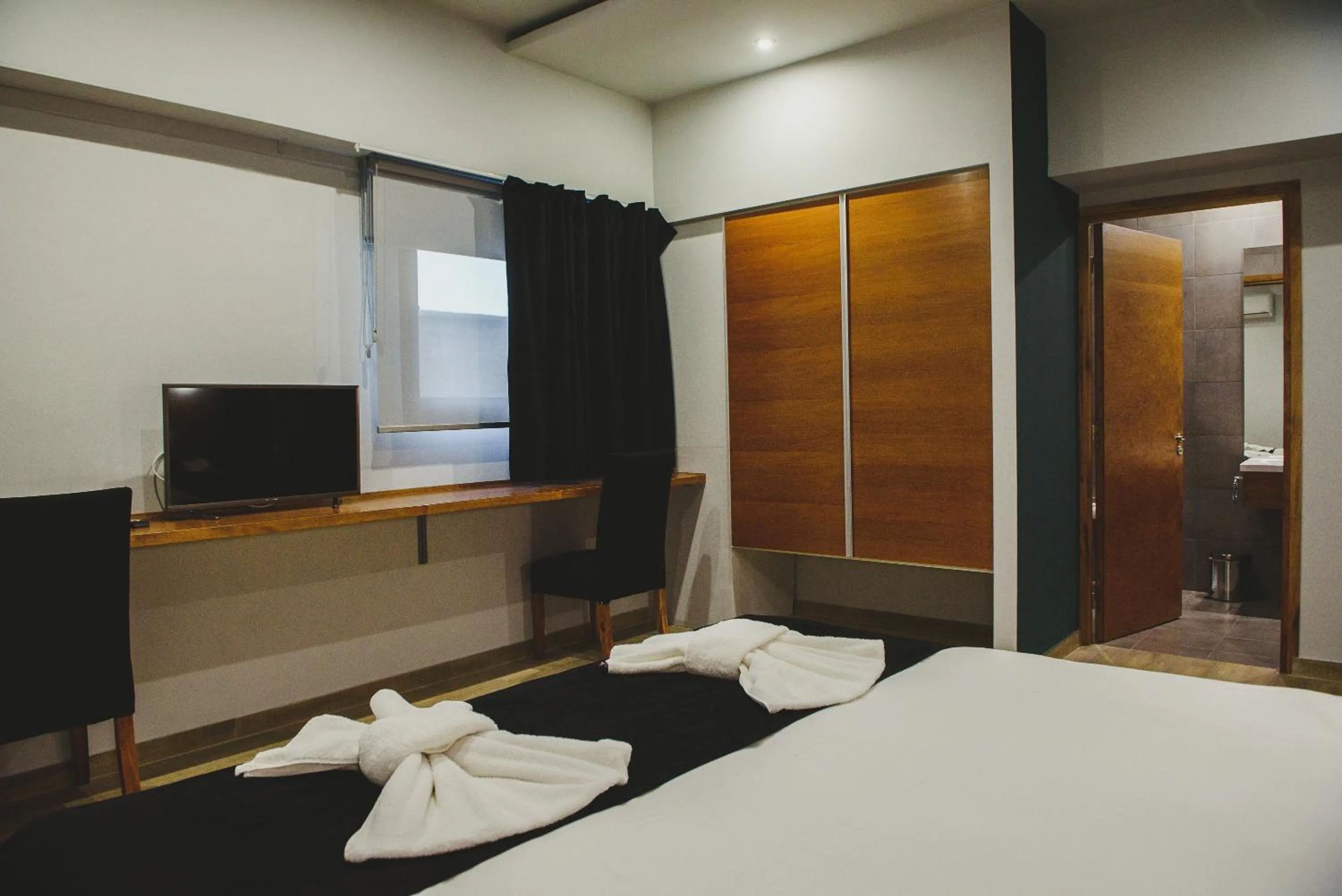 Photo of the whole room, Bed in Plaza Paradiso Petit Hotel