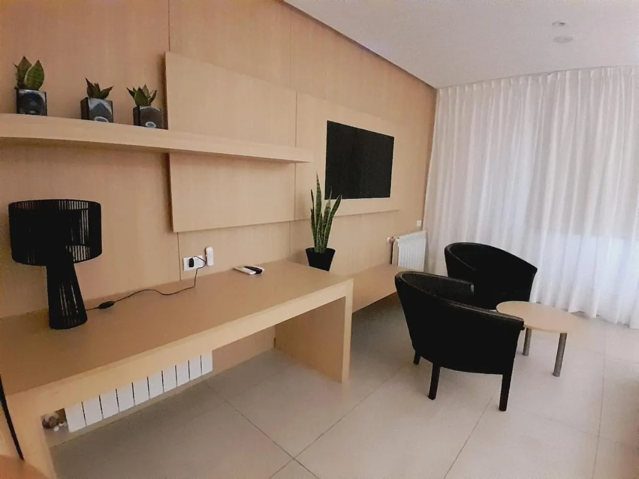 TV and multimedia in Plaza Paradiso Petit Hotel