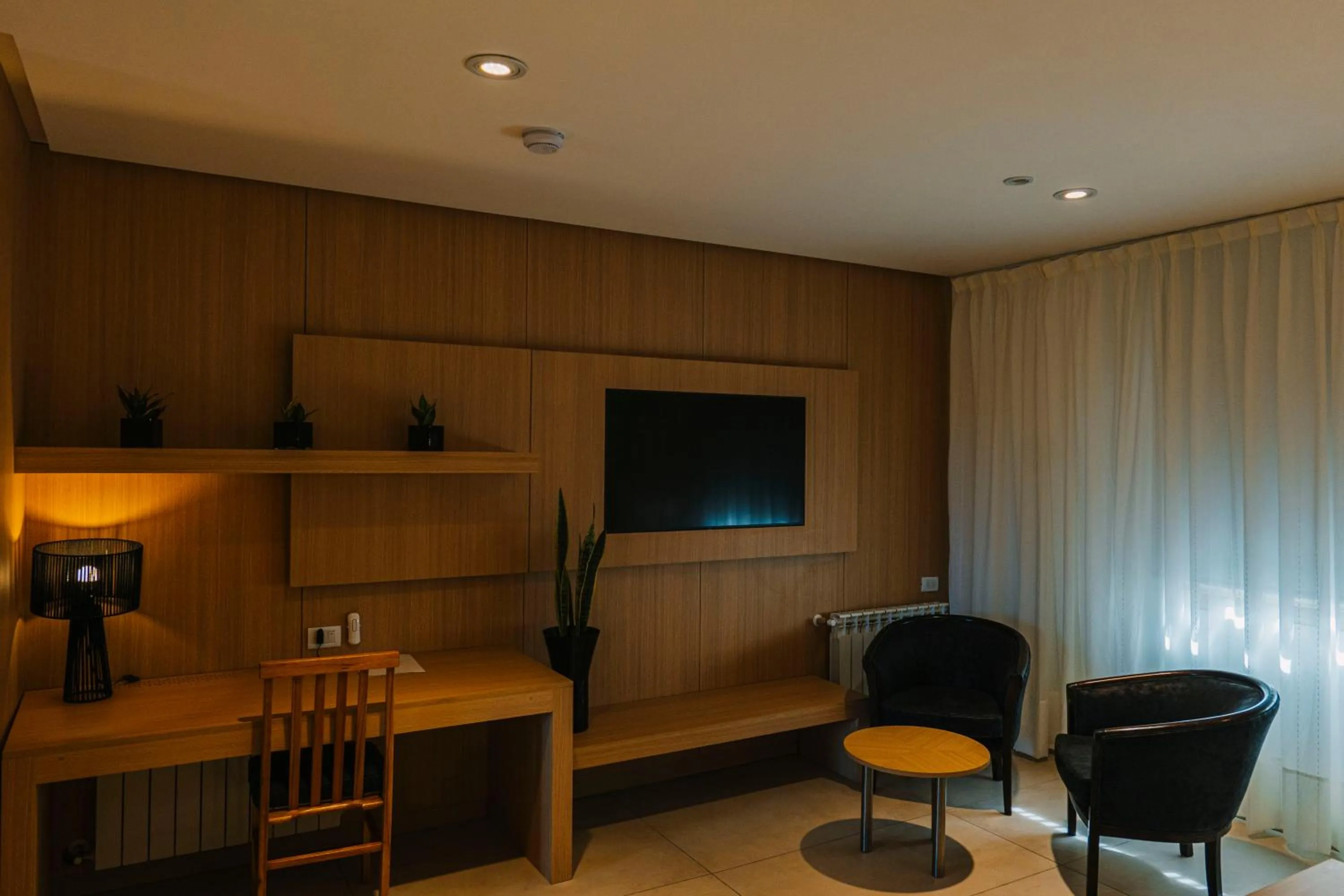 Seating area in Plaza Paradiso Petit Hotel