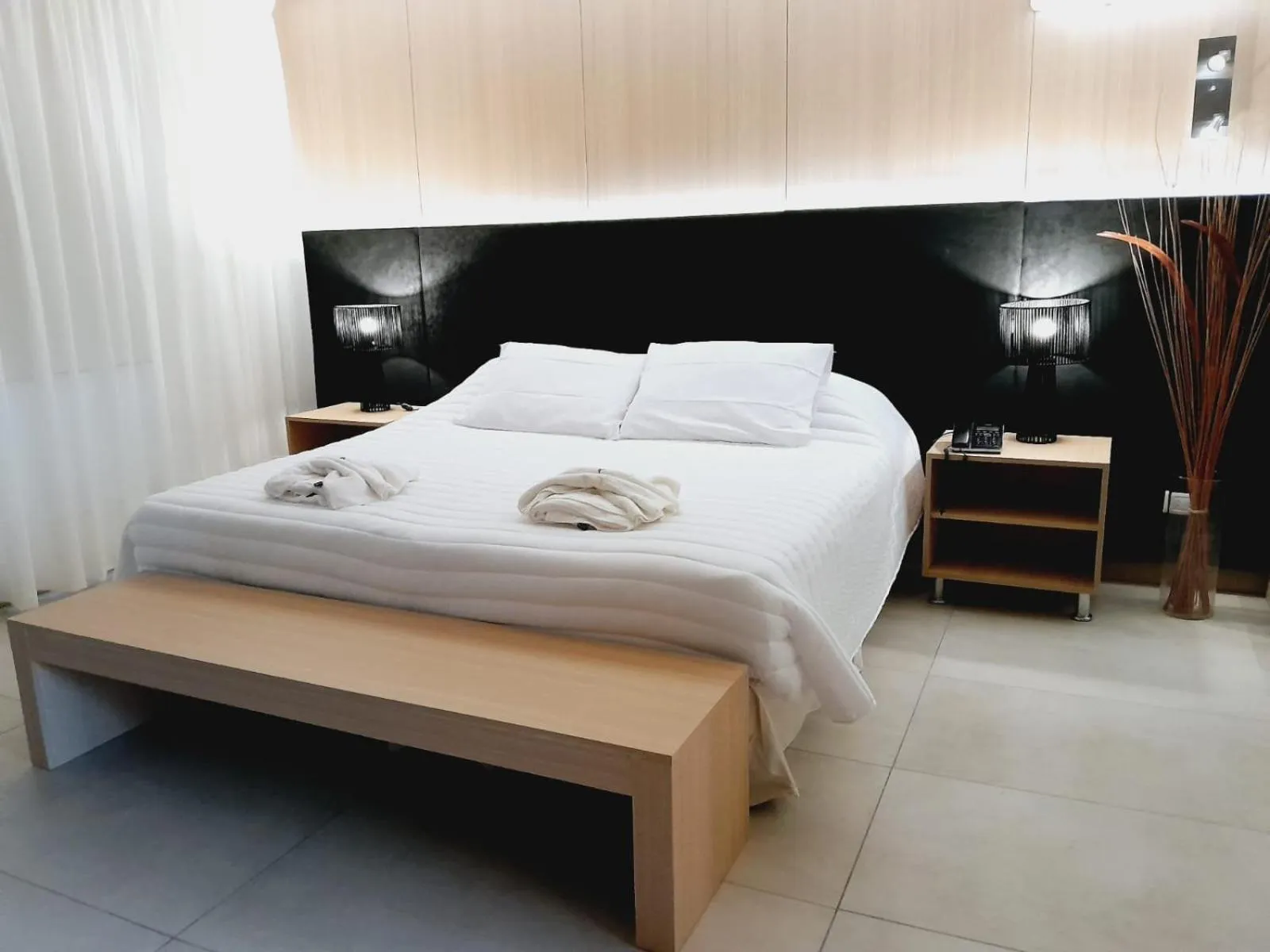 Bed in Plaza Paradiso Petit Hotel