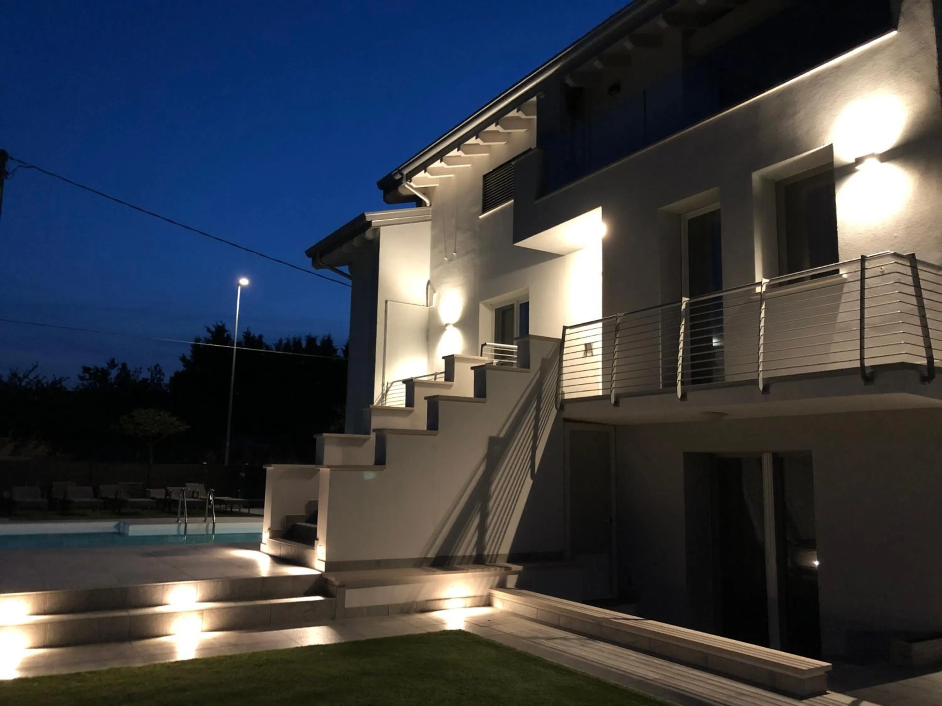 Pool view in B&B Alma Garda Lake