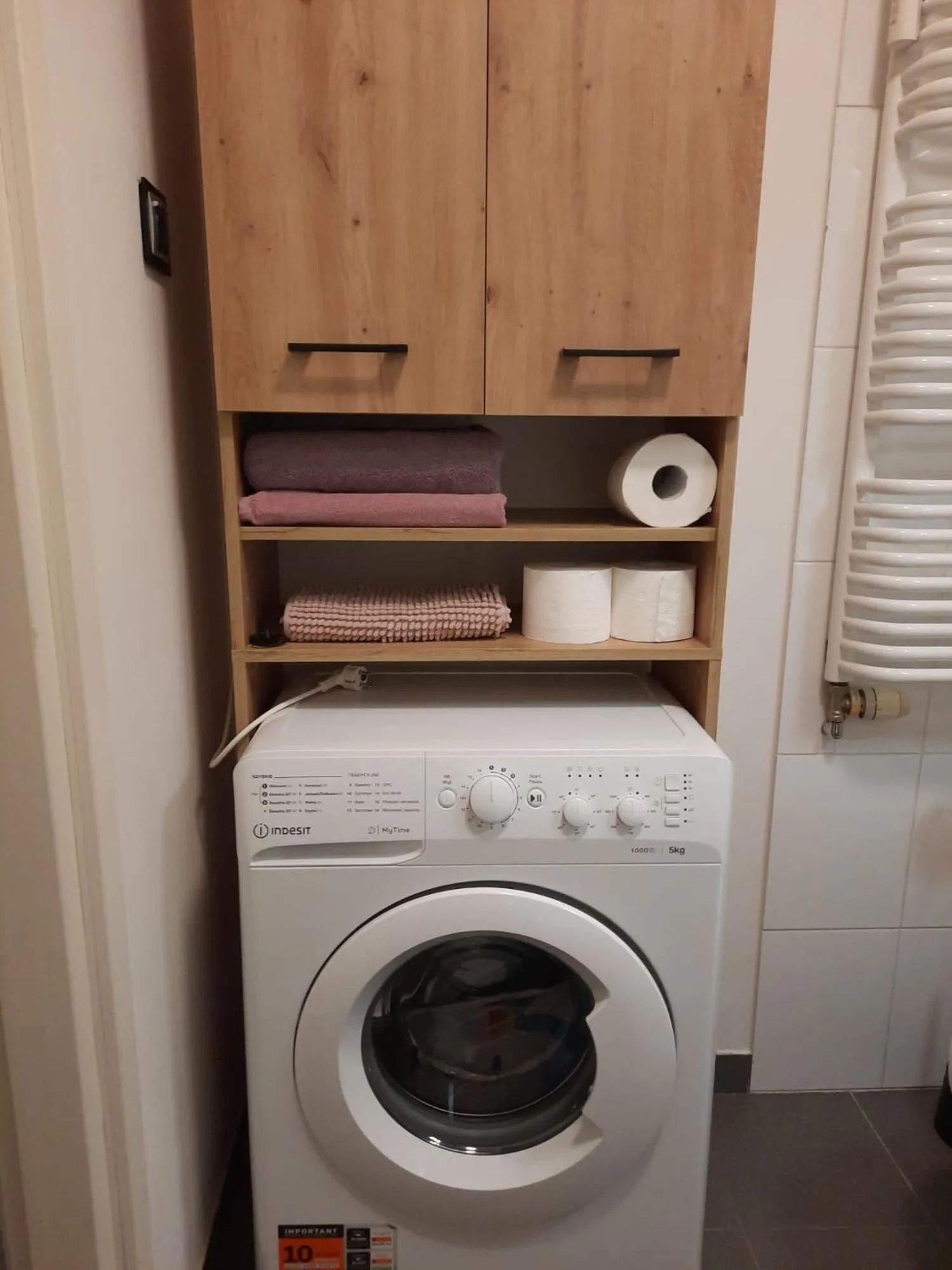 washing machine in Apartamenty Trzy Wieze