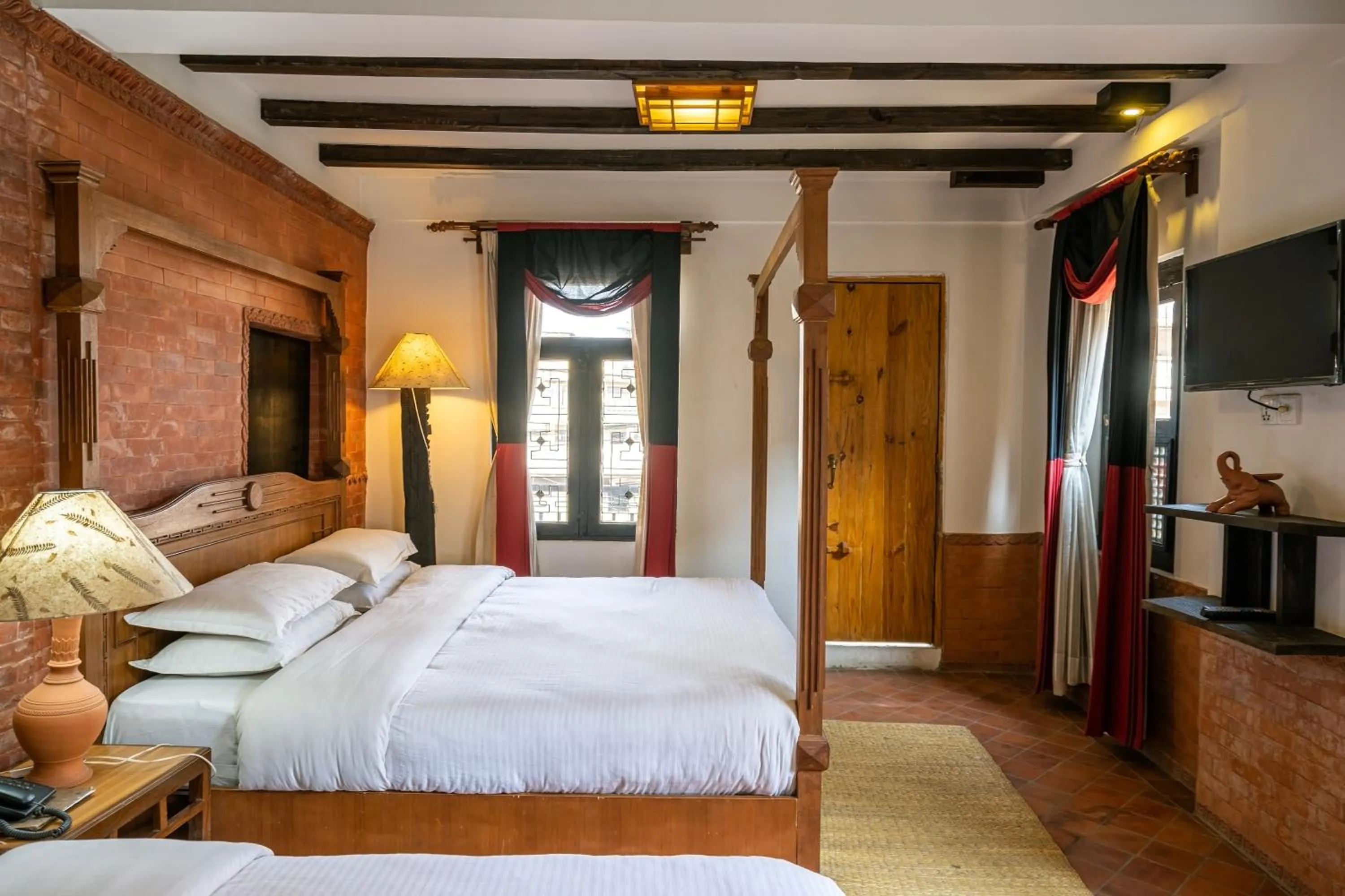 TV and multimedia, Bed in Hotel Ganesh Himal