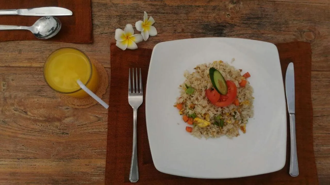 Asian breakfast in Nipuri Resort and Villas Seminyak by Kamara