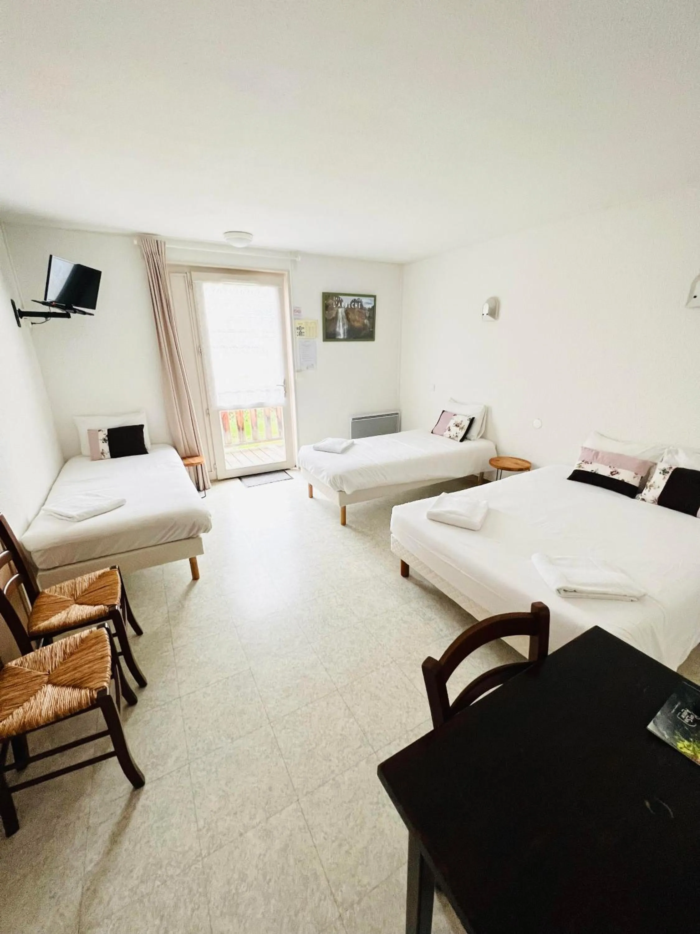 Bed in Hôtel Rose des Vents