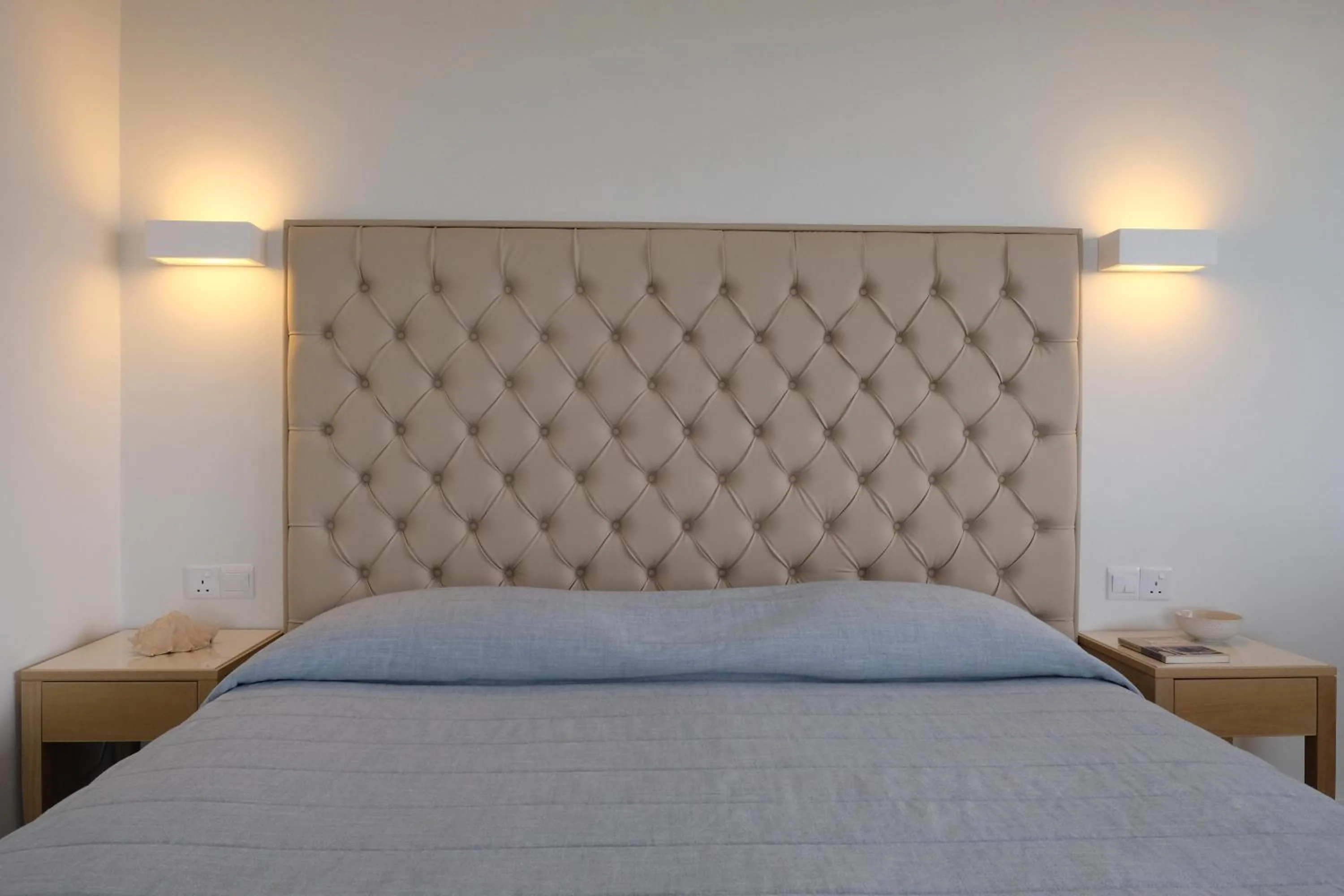 Bed in Sunrise Beach Hotel