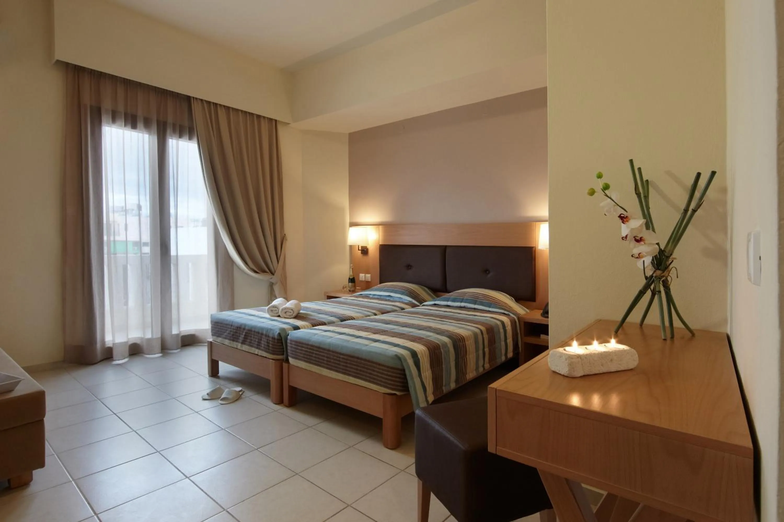 Bedroom, Bed in Dimitra Hotel & Apartments by Omilos Hotels