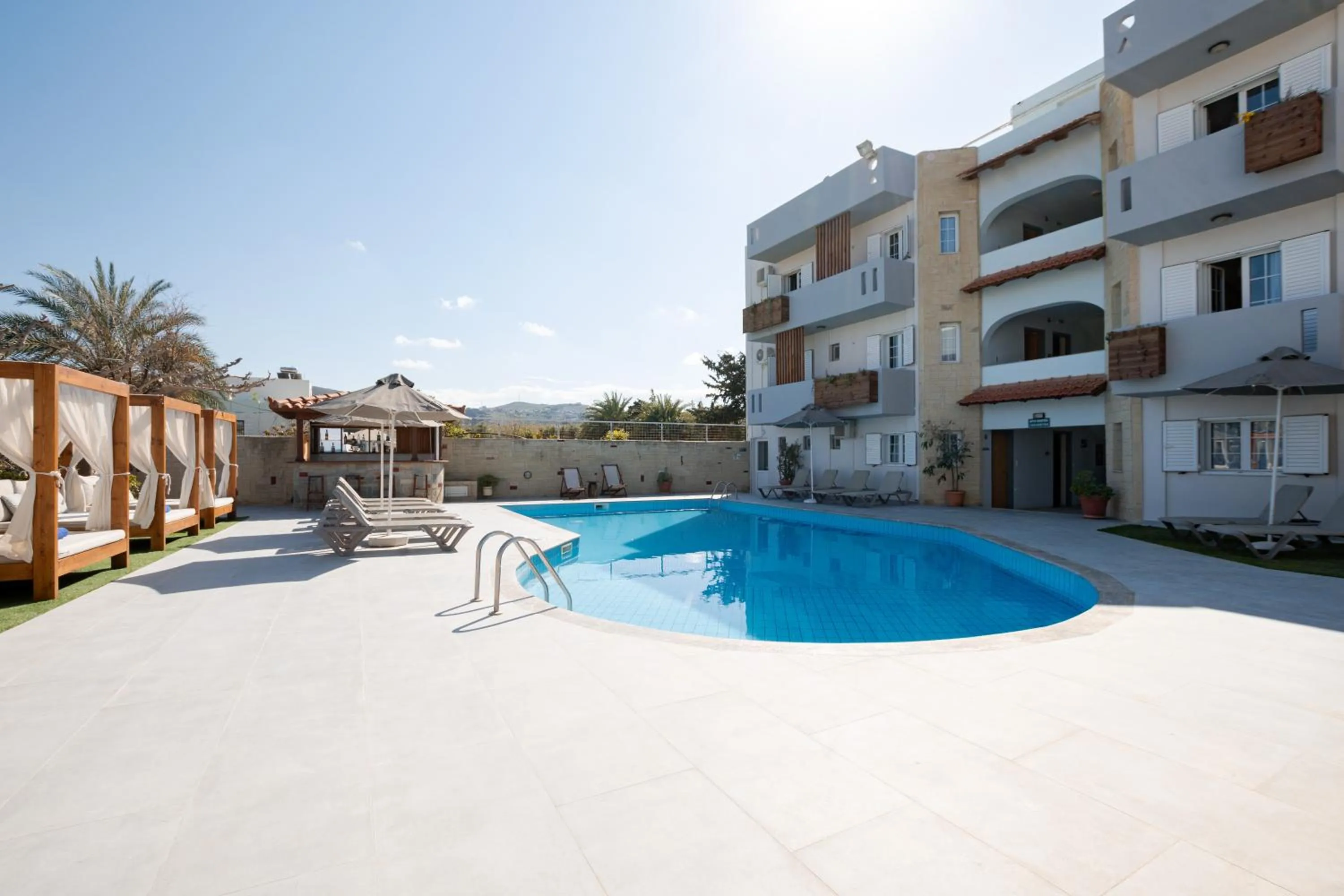 Pool view in Dimitra Hotel & Apartments by Omilos Hotels