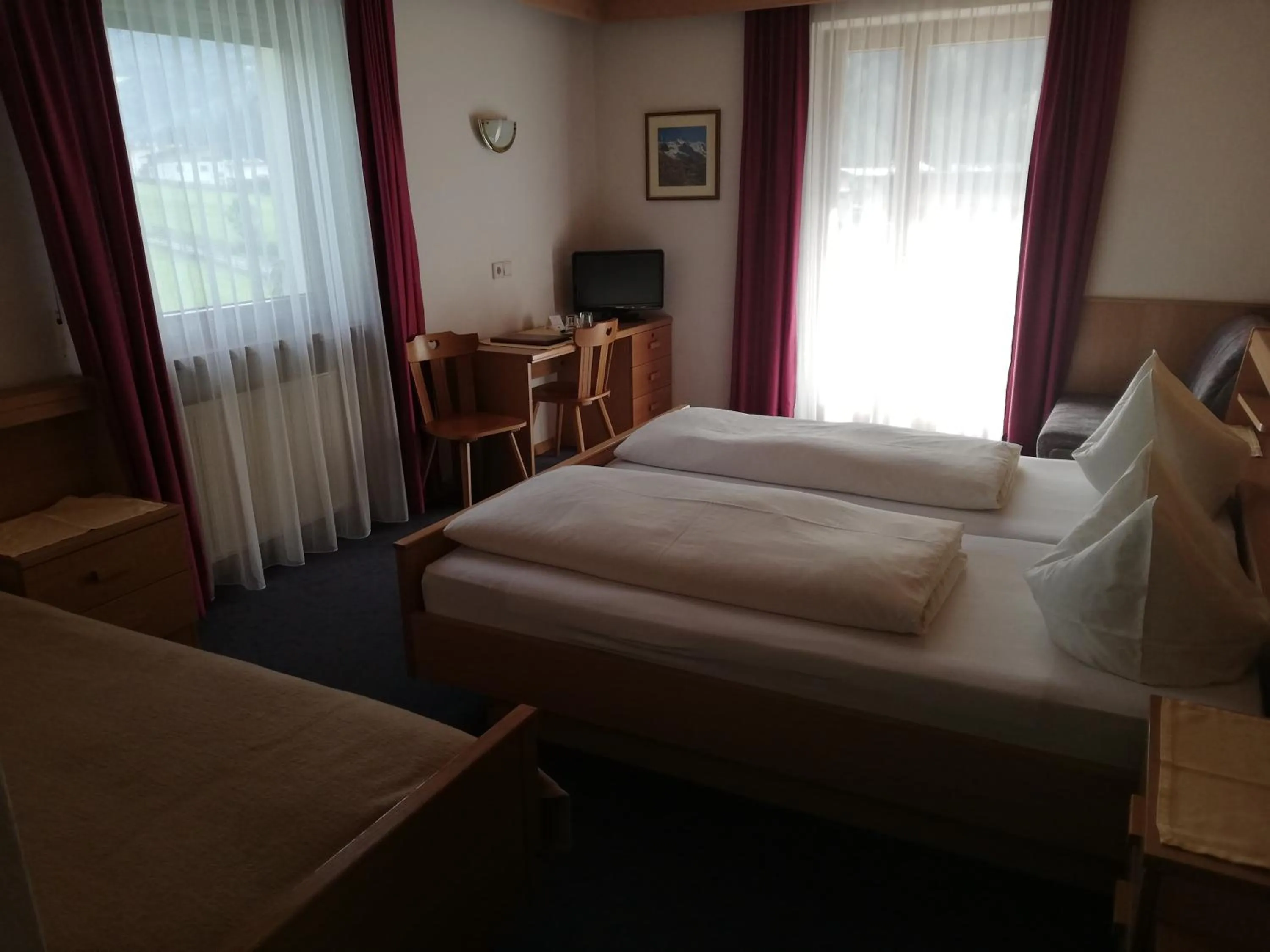 Photo of the whole room, Bed in Naturhotel Haller