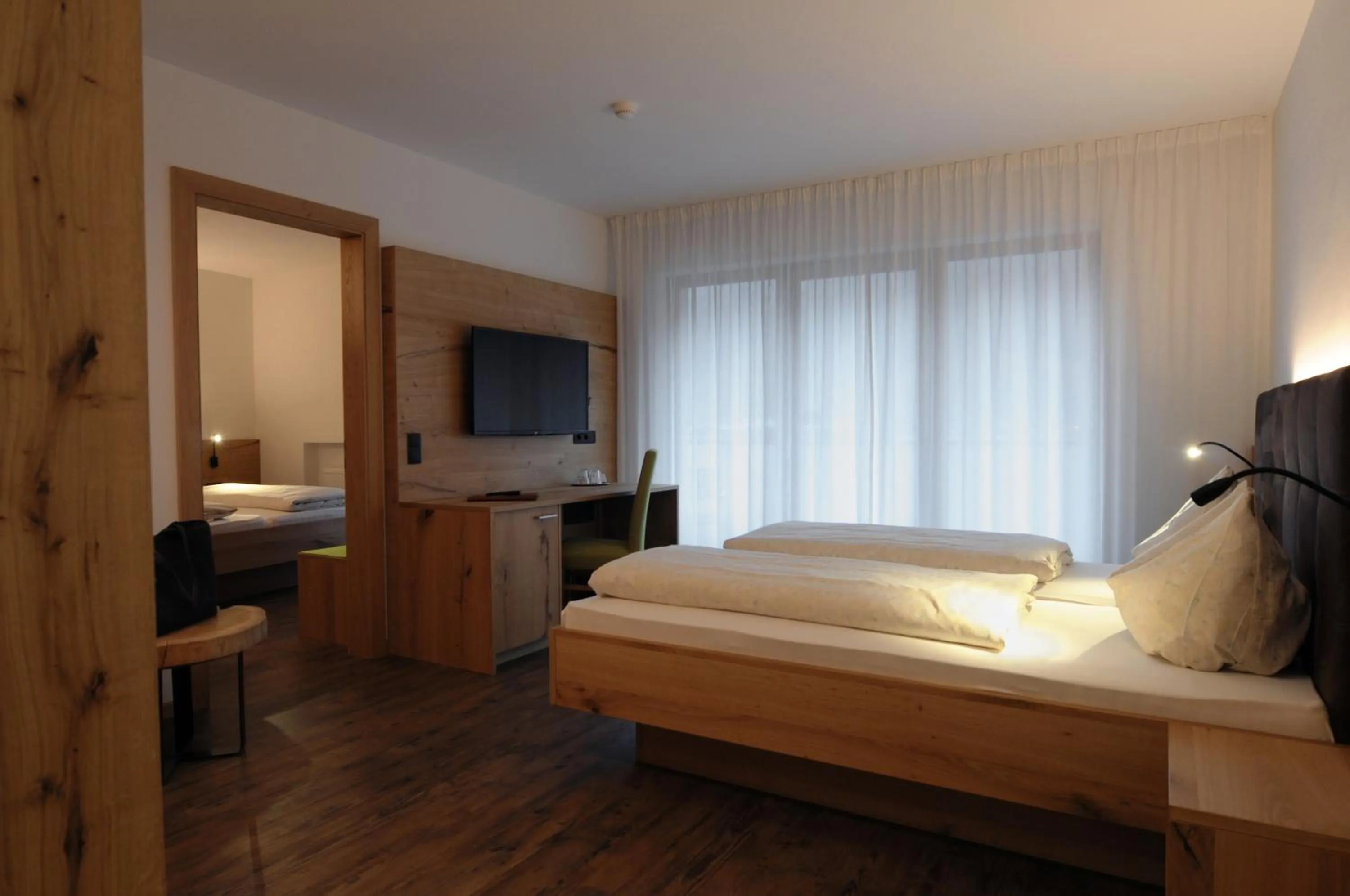 Photo of the whole room, Bed in Naturhotel Haller