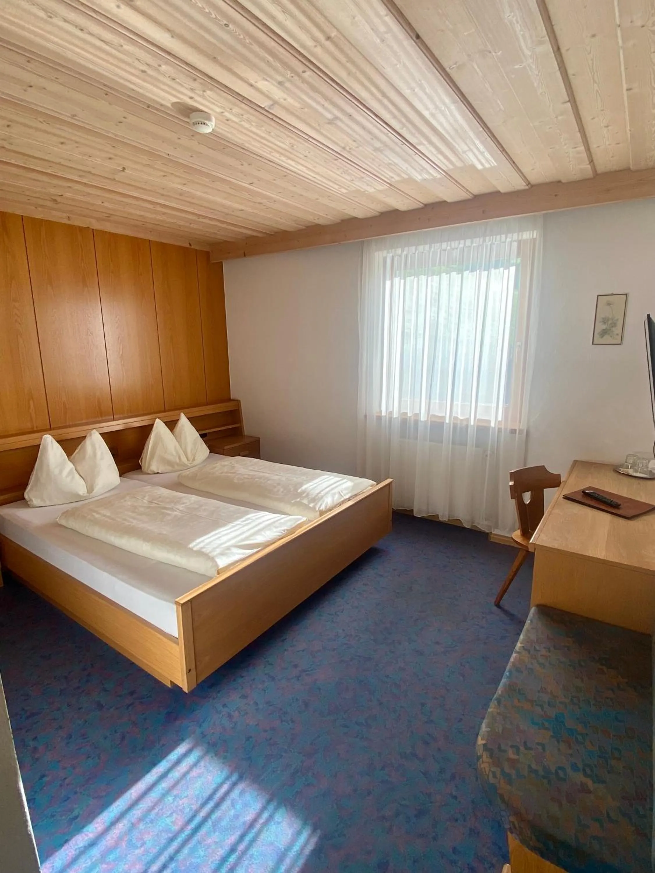 Photo of the whole room, Bed in Naturhotel Haller
