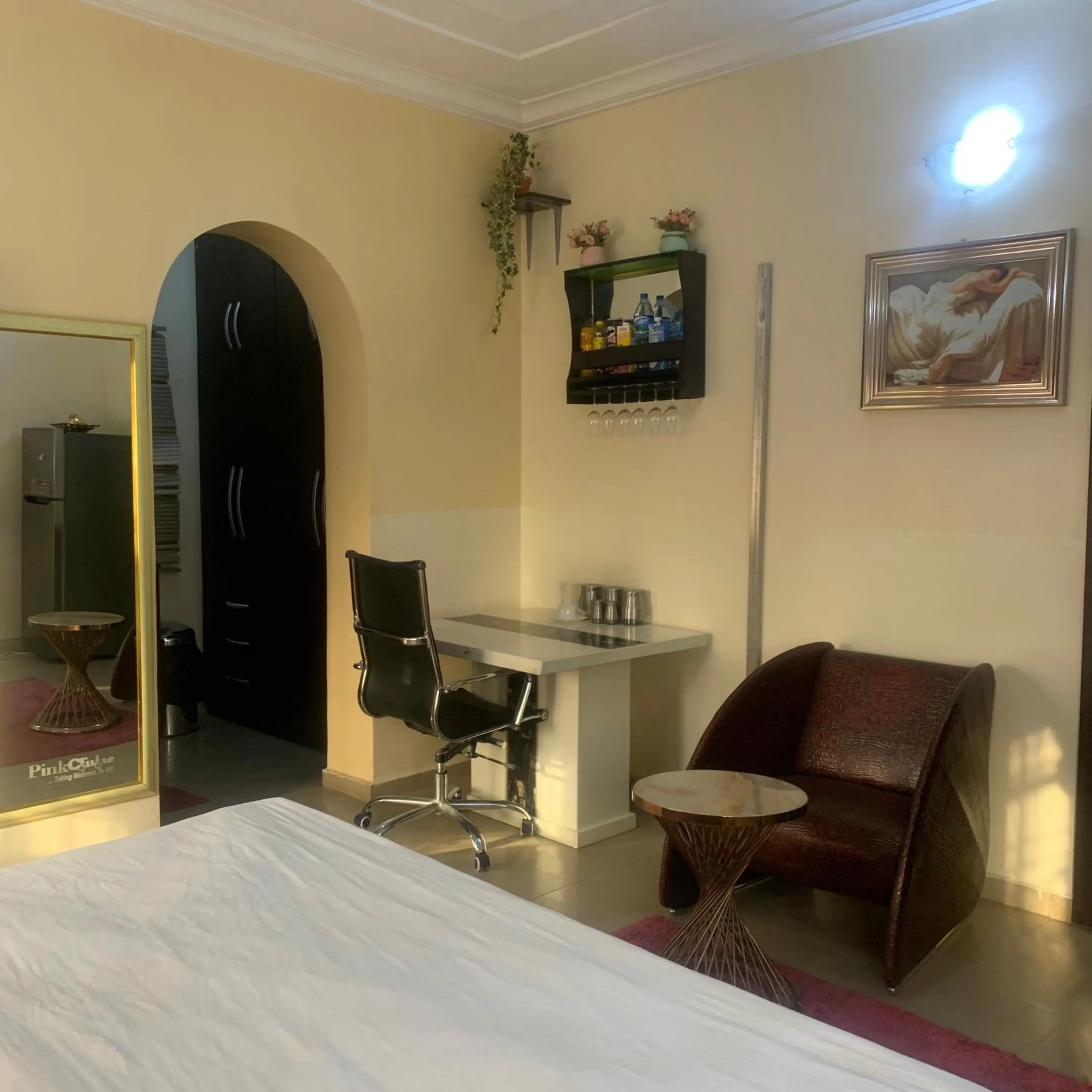 Seating area, Bed in Health Plaza Abuja