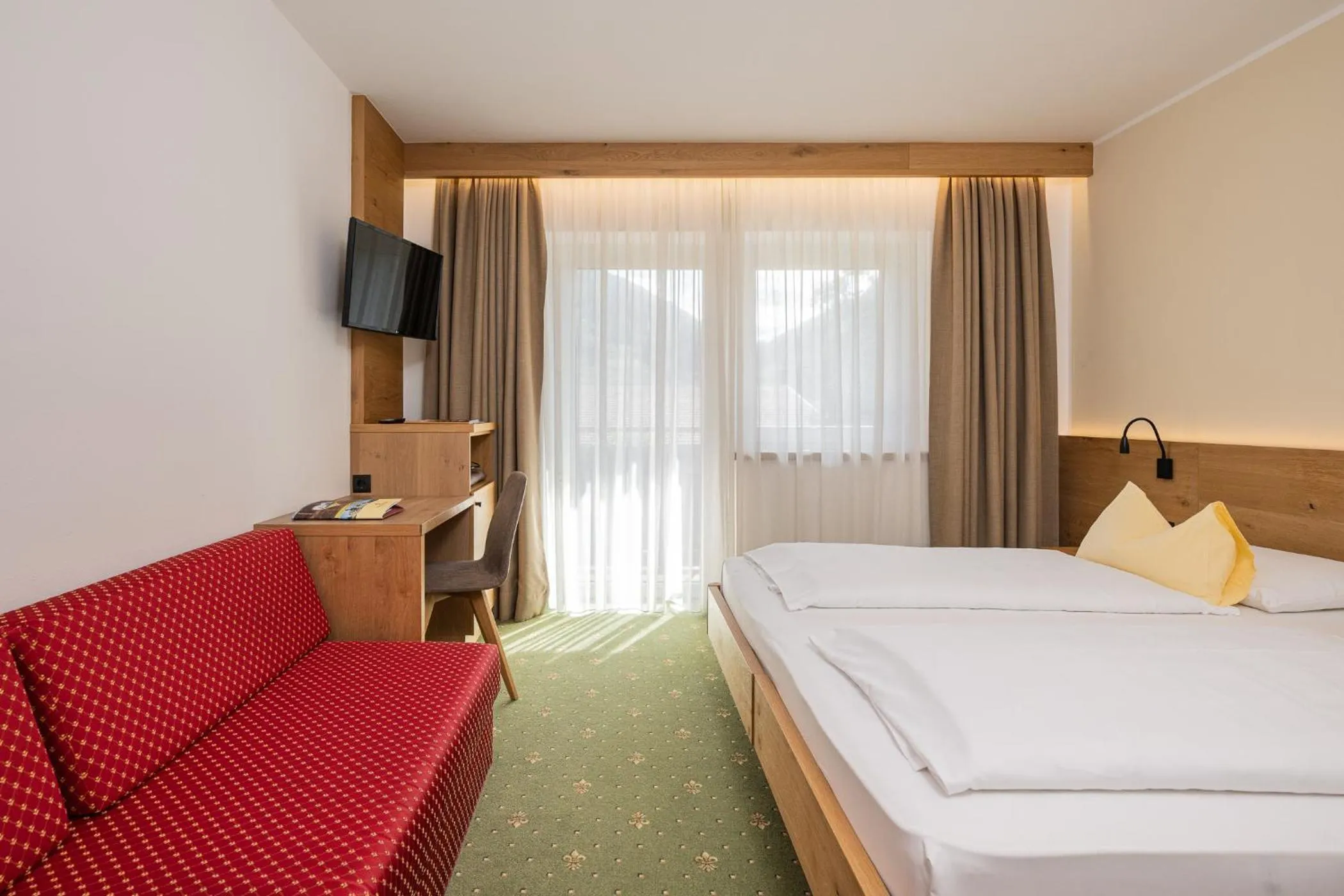 Photo of the whole room, Bed in Wirtshaushotel Alpenrose