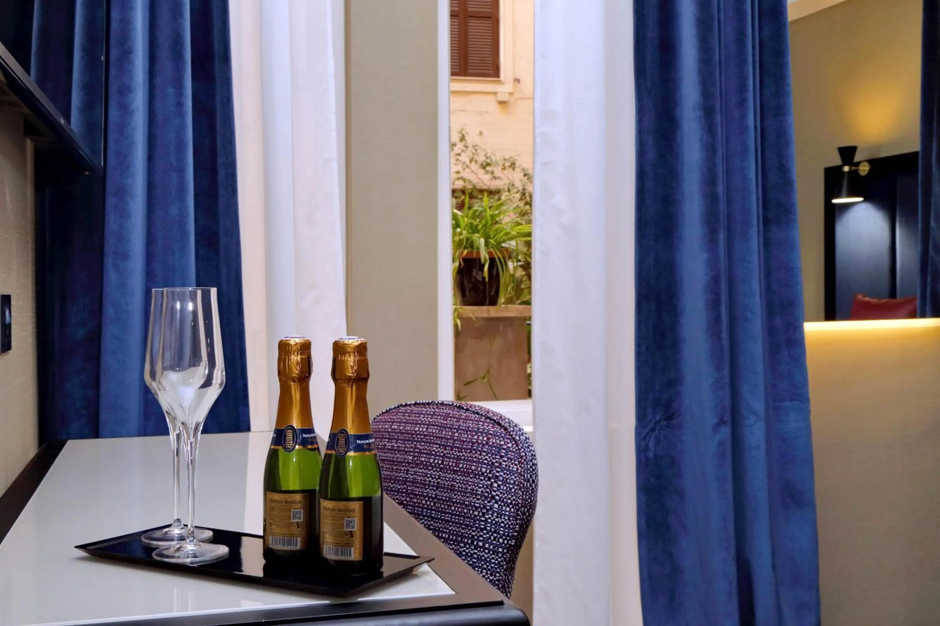 Bedroom in BQ House Colosseo Luxury Rooms