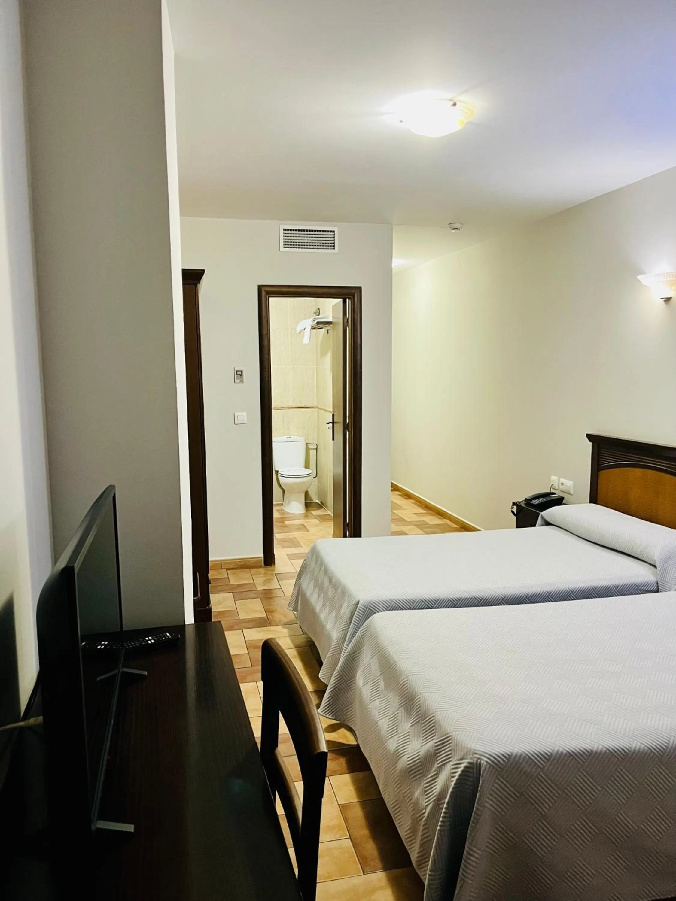 Photo of the whole room, Bed in Hotel Cervantes