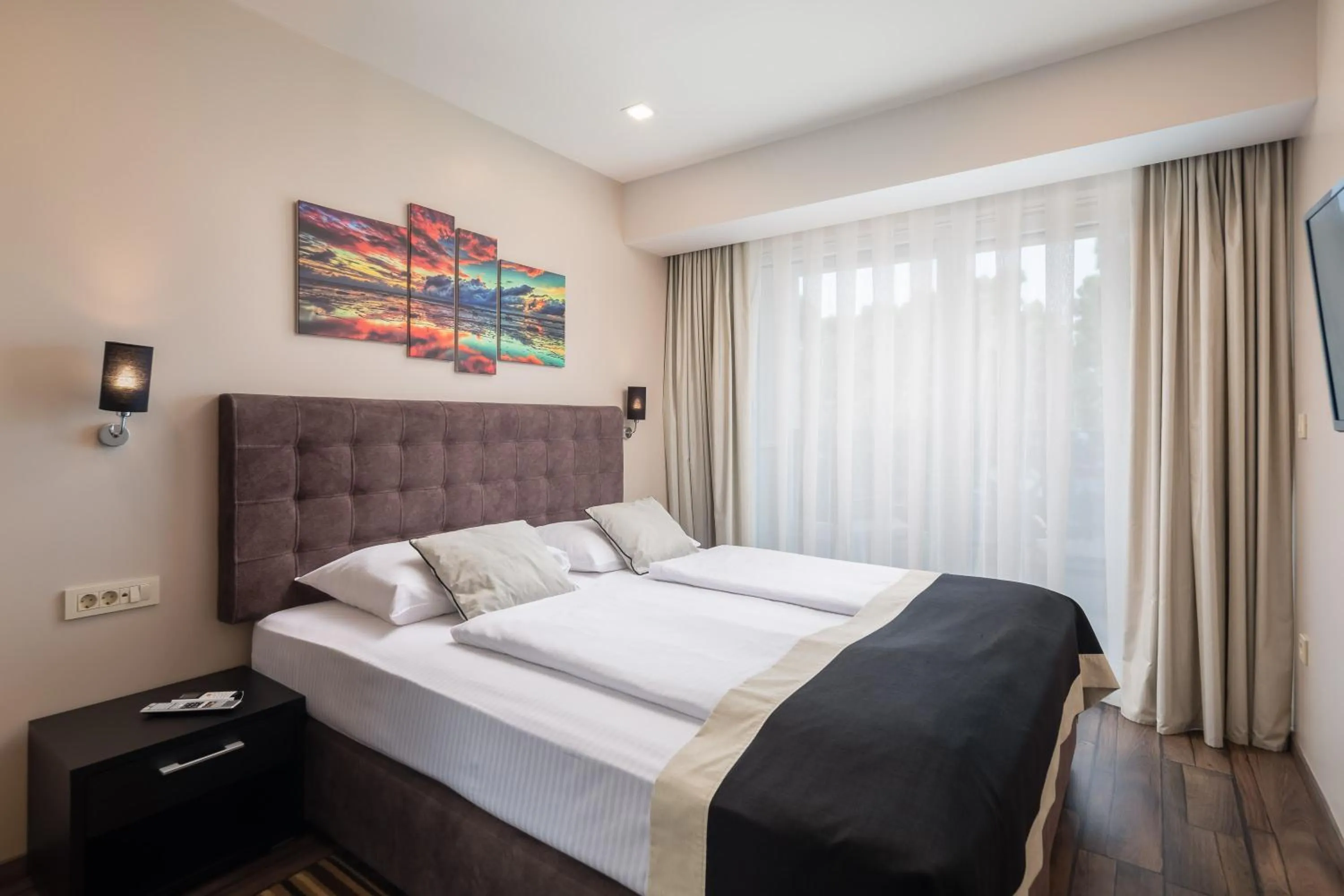 Bed in Hotel Central Beach 9