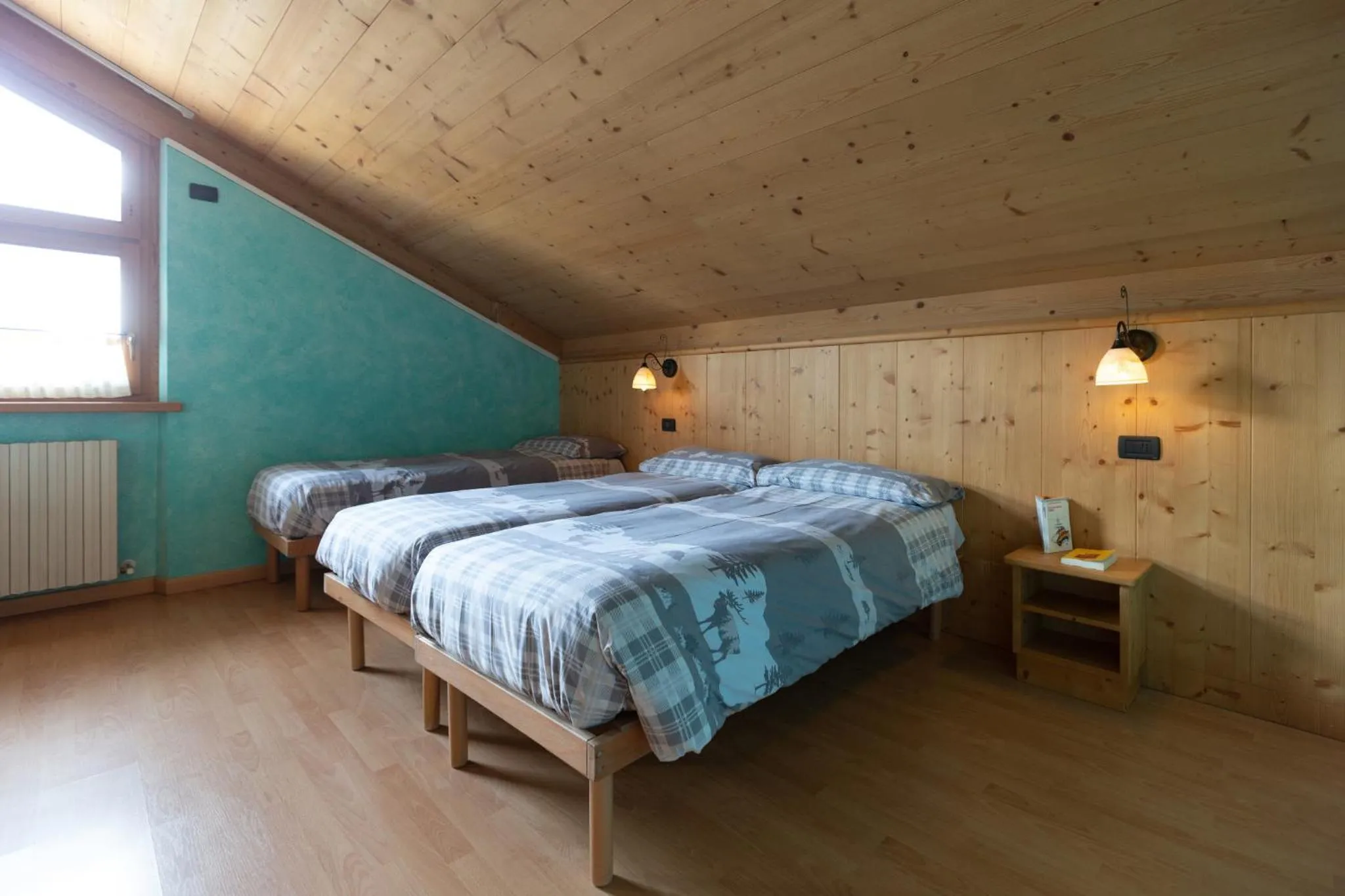 Bed in La Grolla Rooms & Apartments