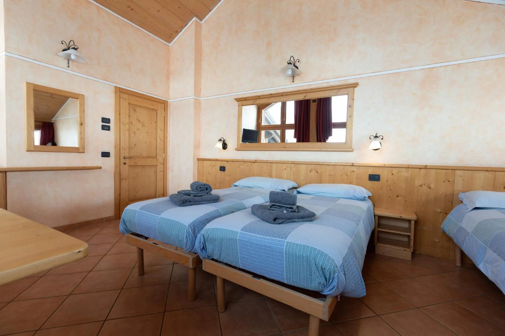 Bed in La Grolla Rooms & Apartments