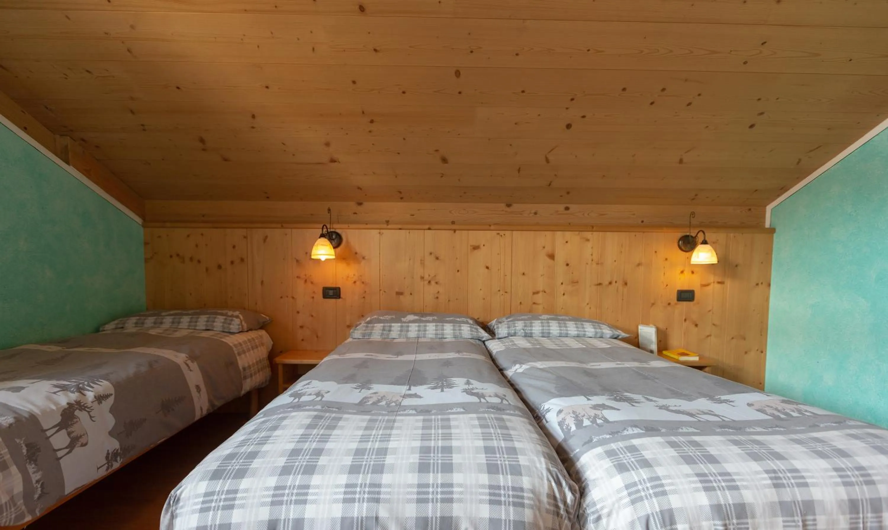 Bed in La Grolla Rooms & Apartments