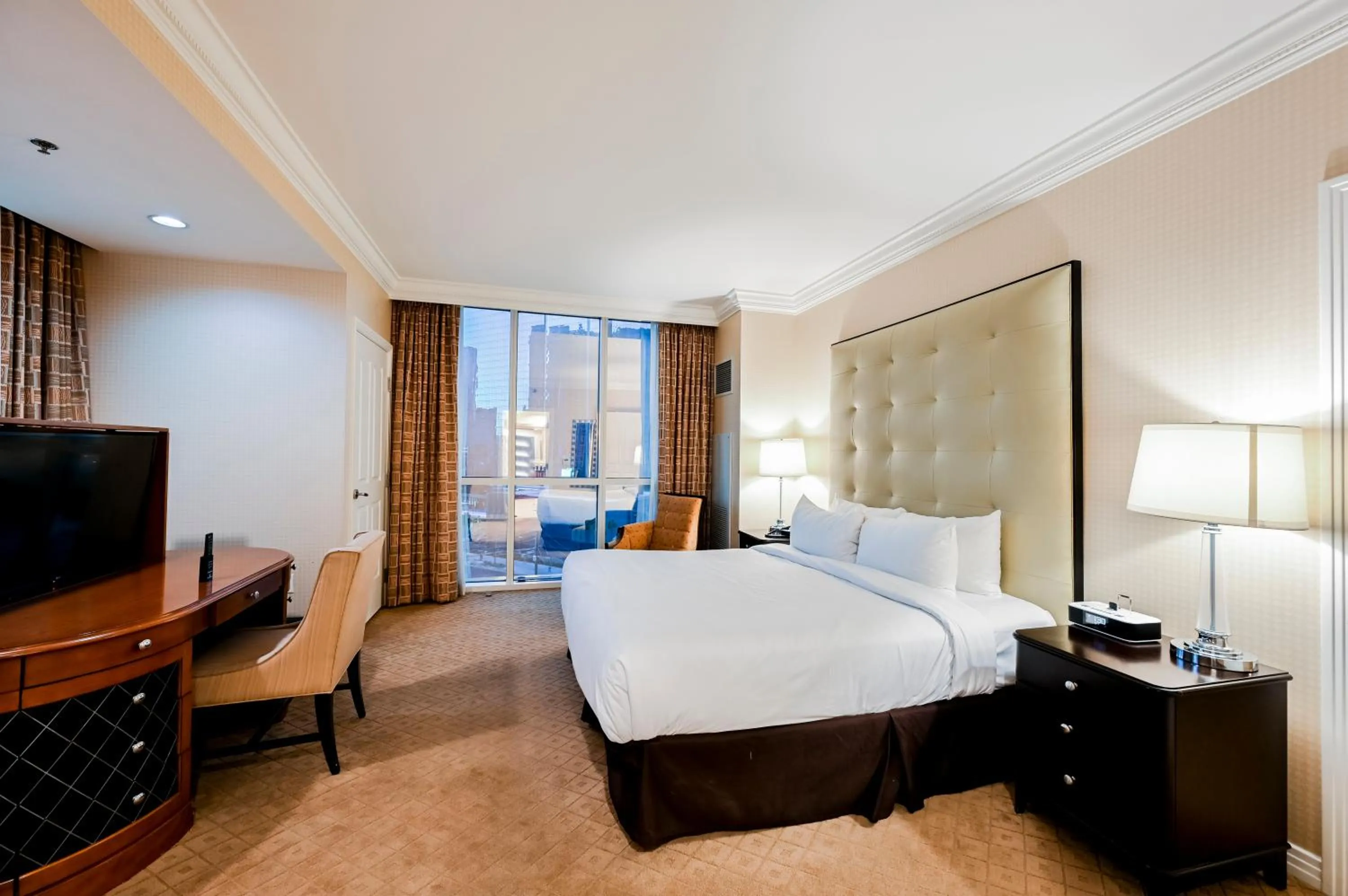 Bed in StripViewSuites at Signature