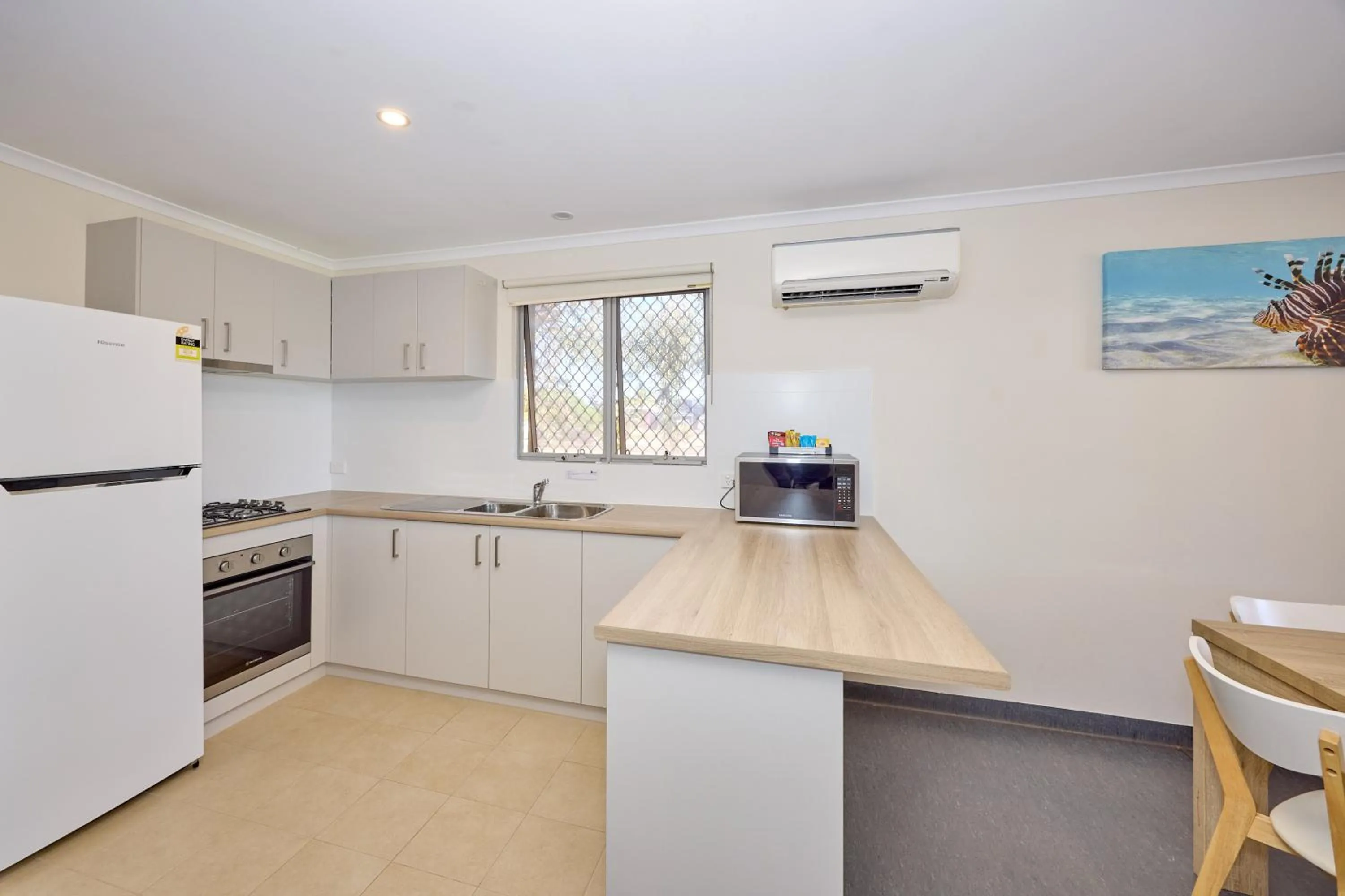Kitchen or kitchenette in RAC Exmouth Cape Holiday Park
