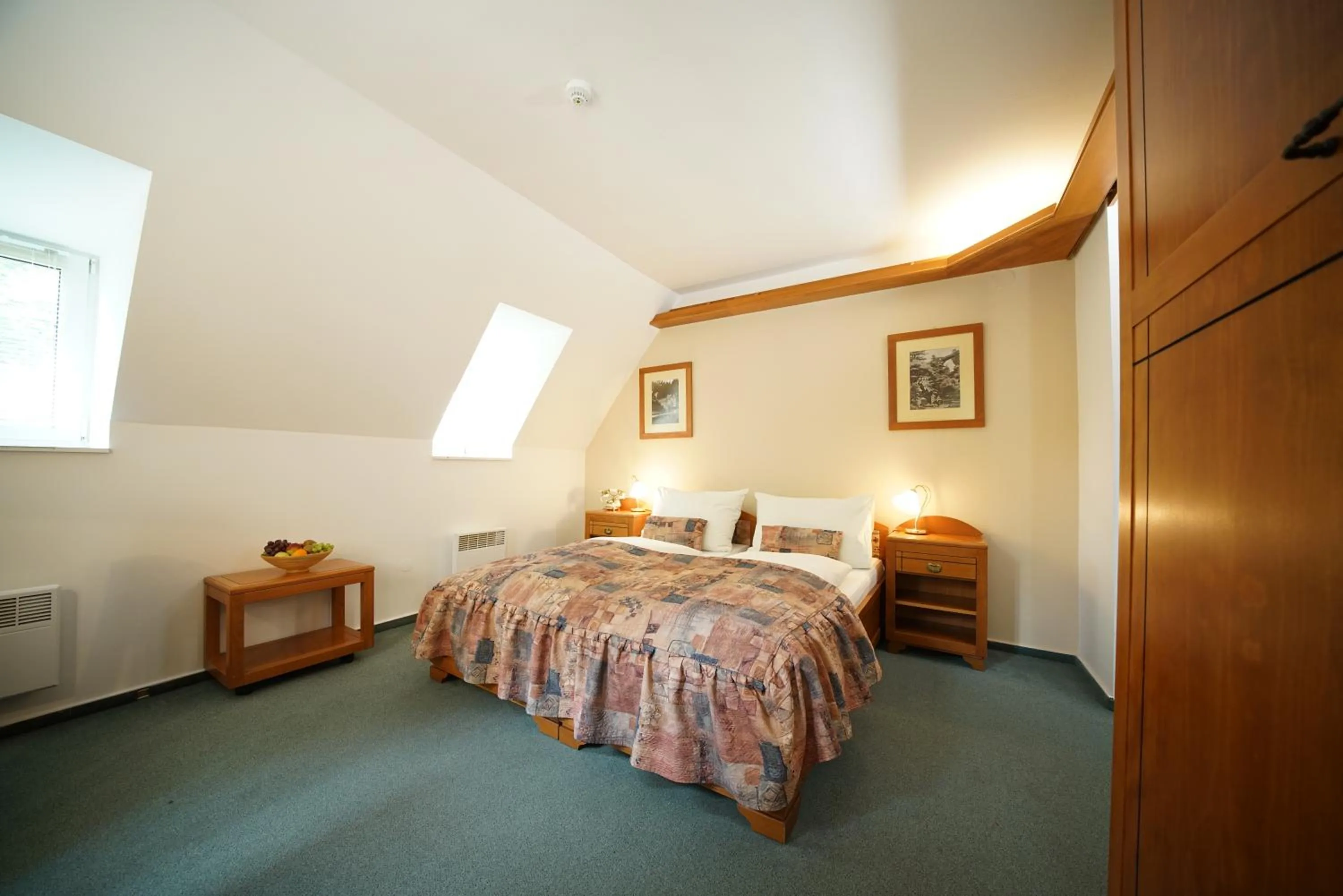 Living room, Bed in Hotel Praha