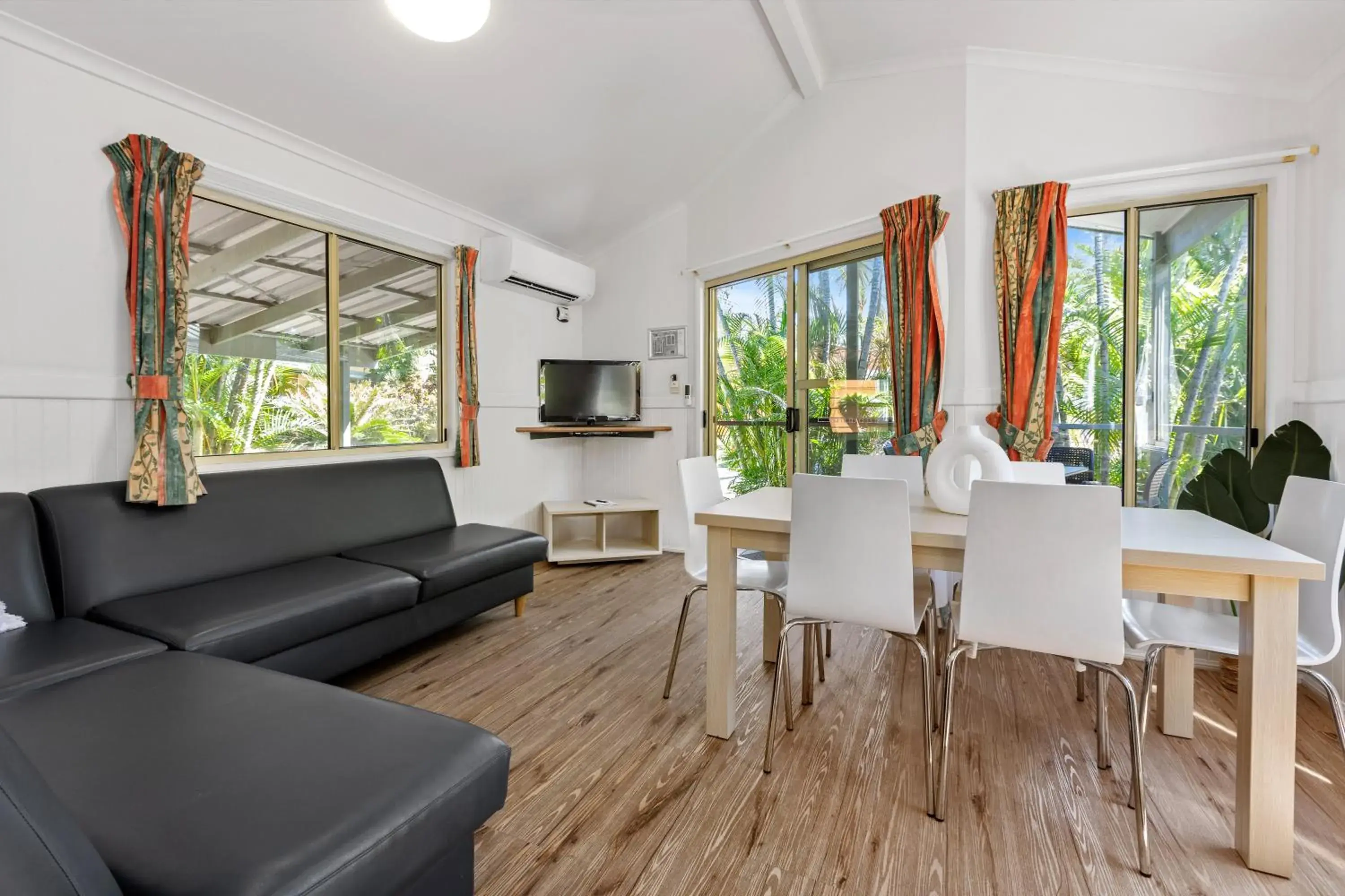 Garden Villa - 1 Queen + 1 Trio Bunk (5 person) in Tasman Holiday Parks - Airlie Beach Garden Villa - 1 Queen + 1 Trio Bunk (5 person) in Tasman Holiday Parks - Airlie Beach