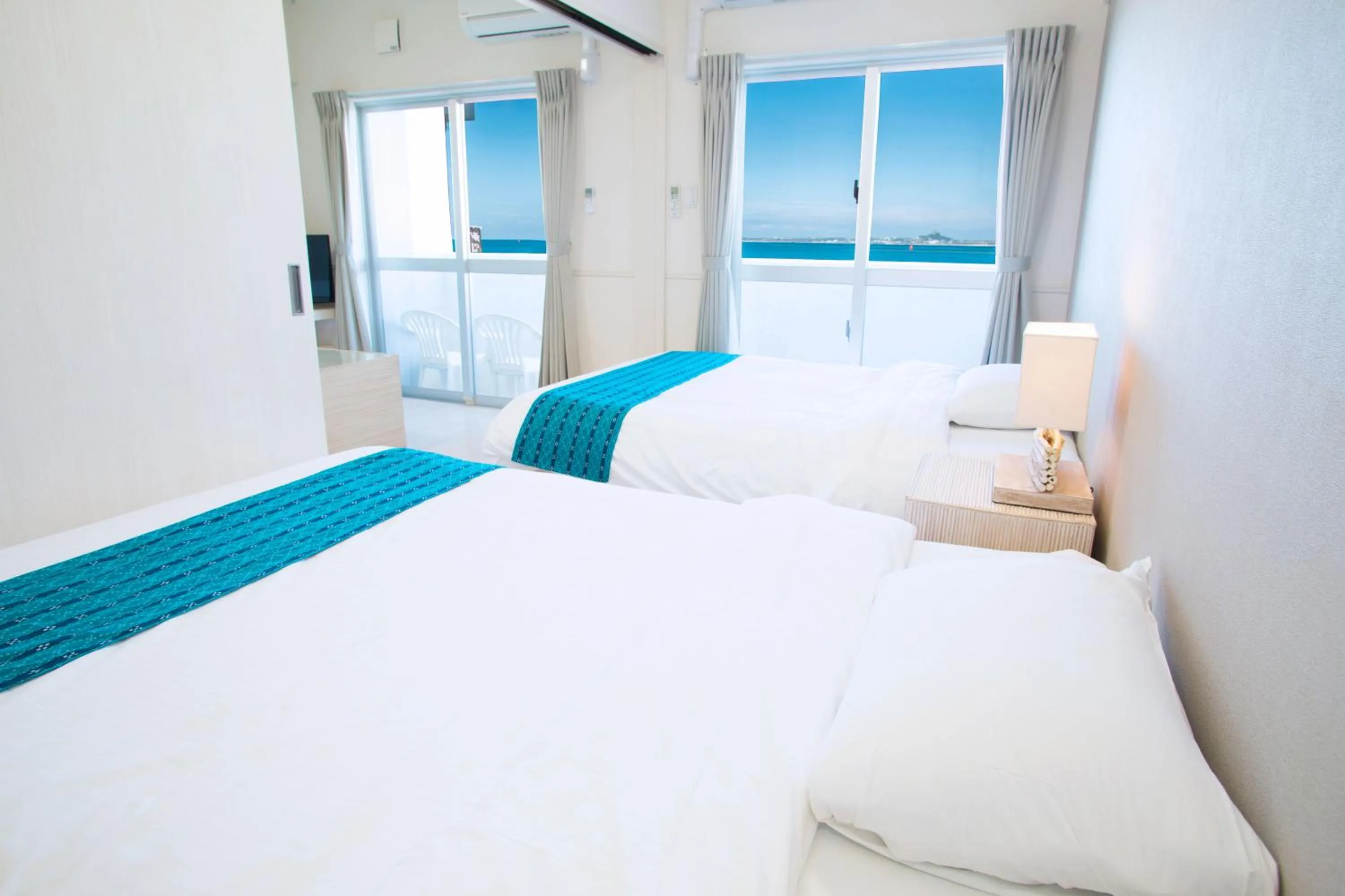 Bathroom, Bed in Costa Bella Condominium Resort