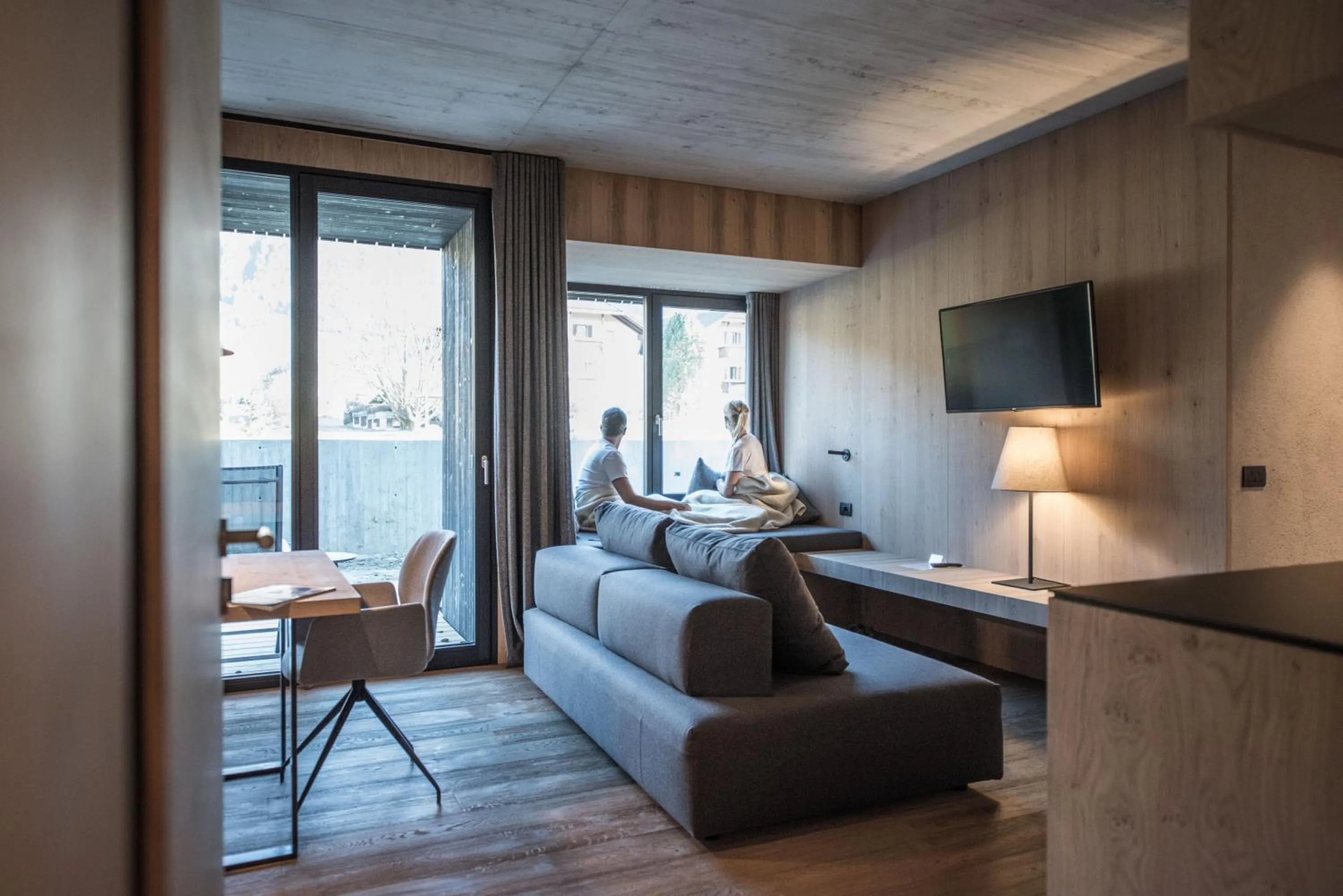 Living room, Bed in Hotel Krondlhof