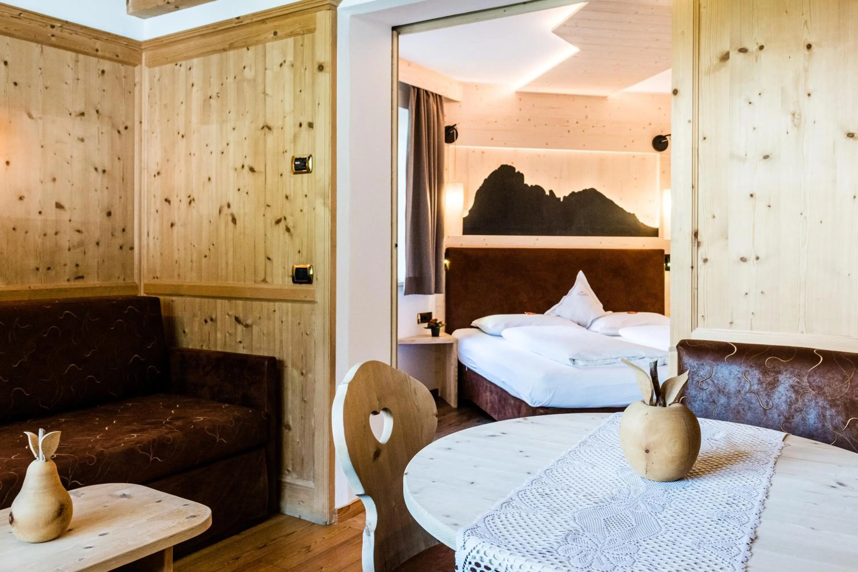 Living room, Bed in Garni Hotel and Apartments Wildbach