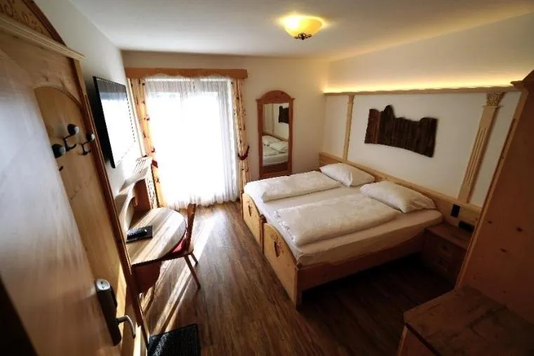 Bed in Garni Hotel and Apartments Wildbach