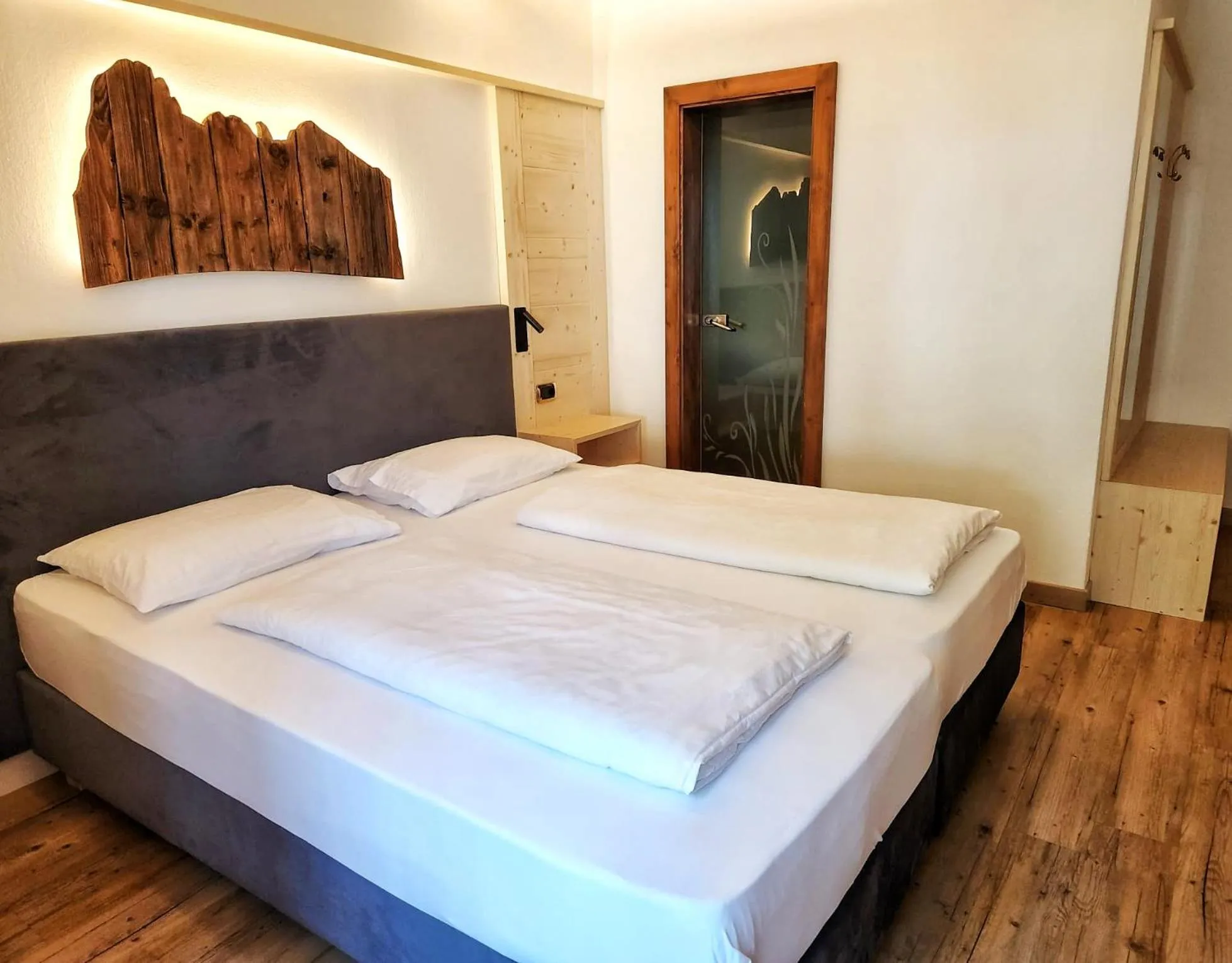 Bed in Garni Hotel and Apartments Wildbach