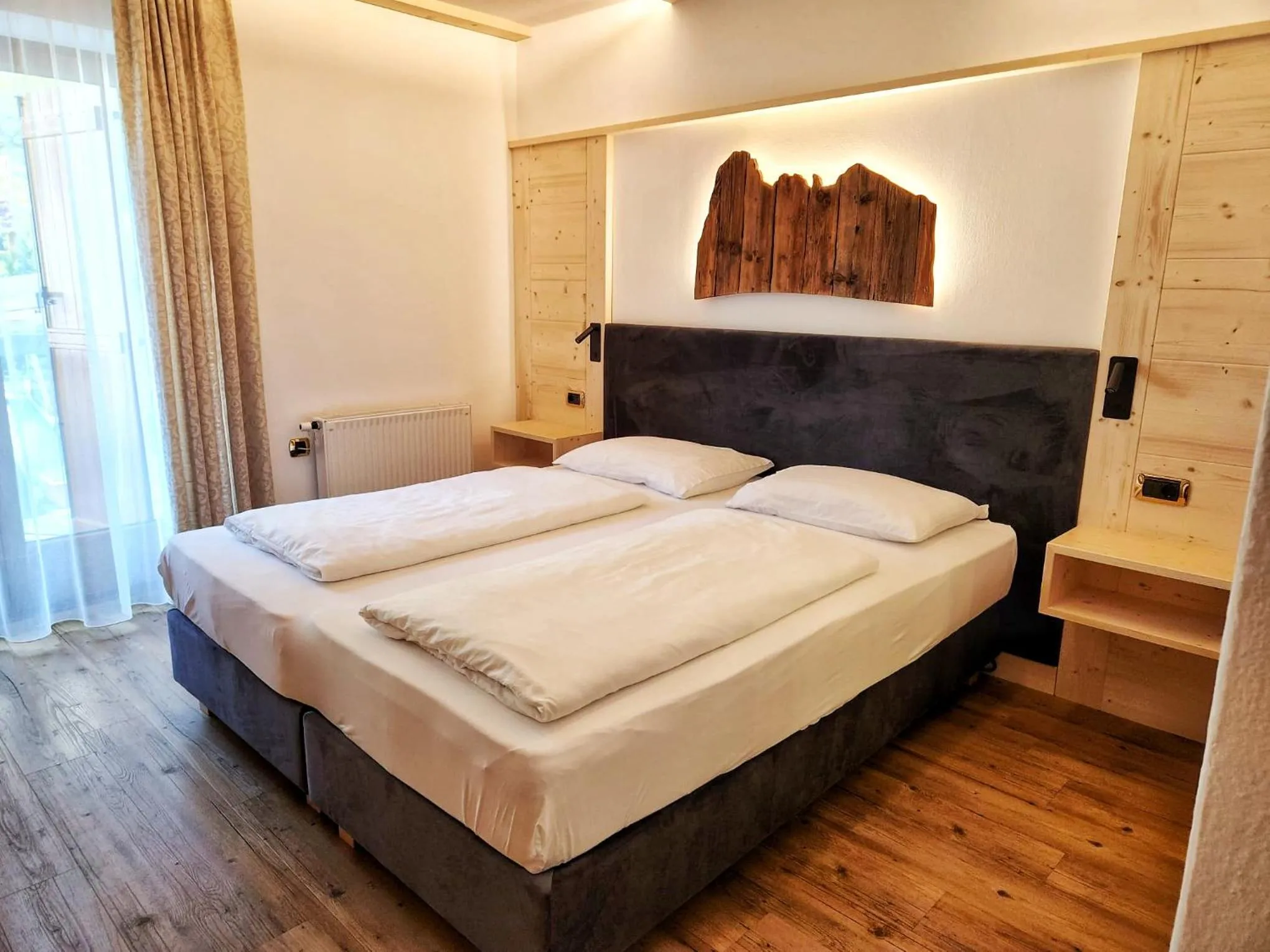 Bed in Garni Hotel and Apartments Wildbach