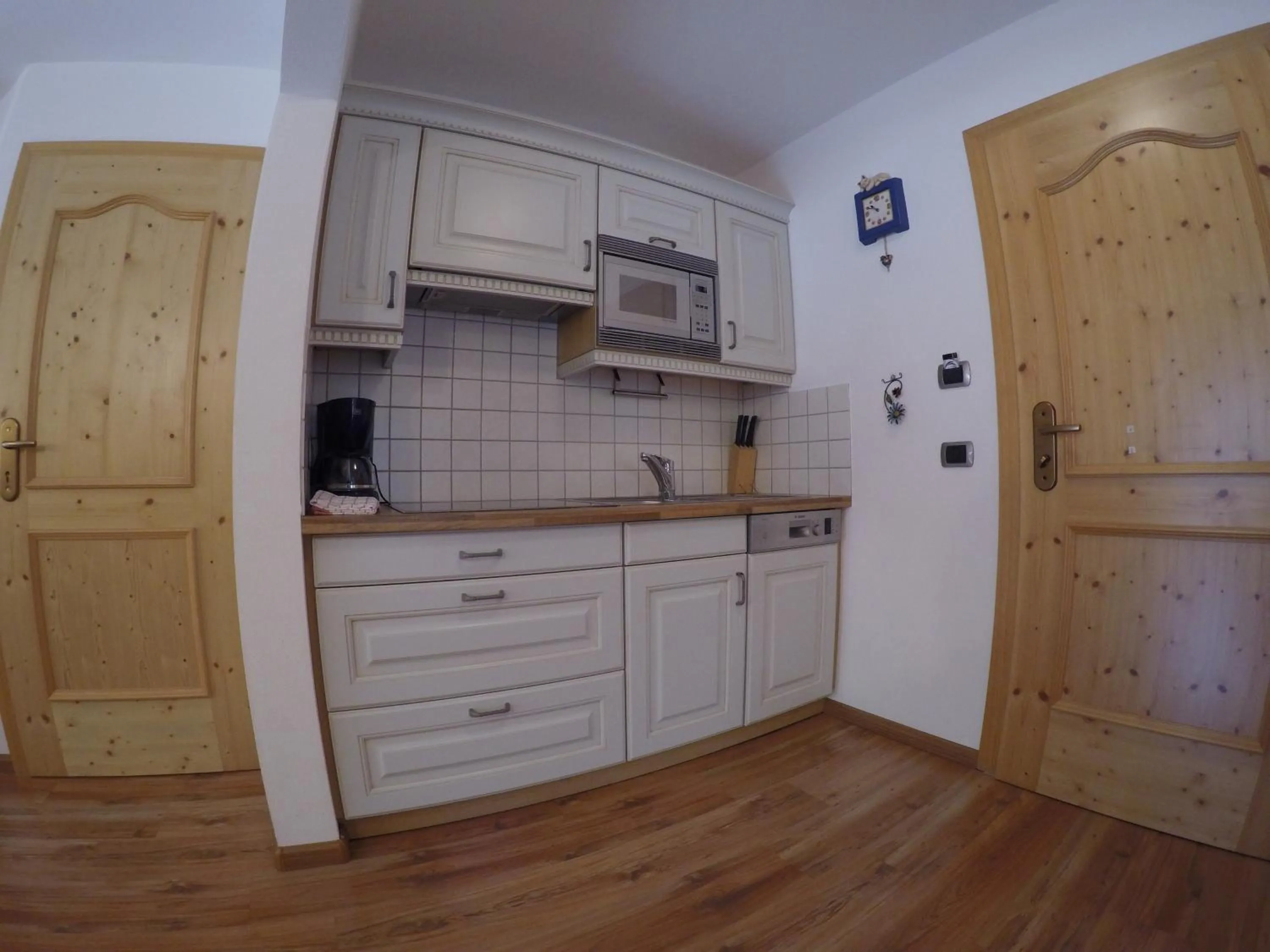 Kitchen or kitchenette in Garni Hotel and Apartments Wildbach