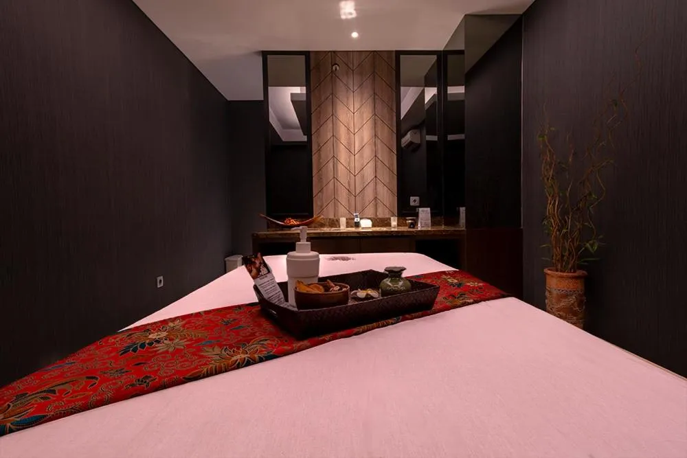 Bed in Grand Picasso Hotel