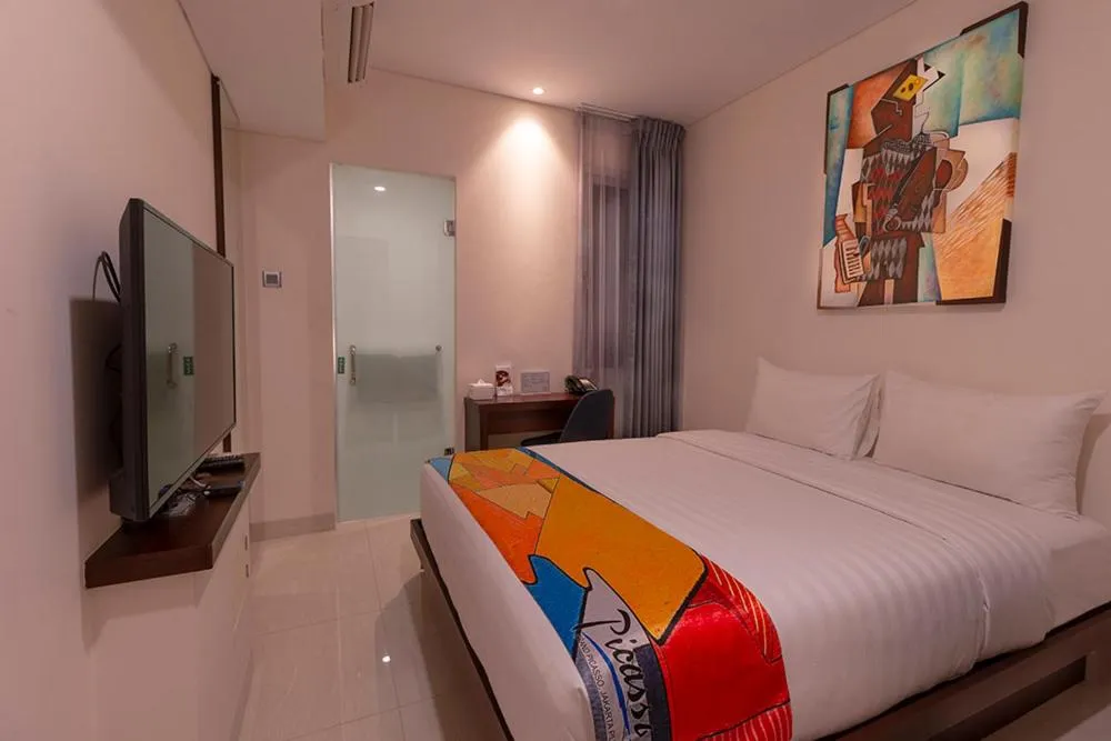 Bed in Grand Picasso Hotel