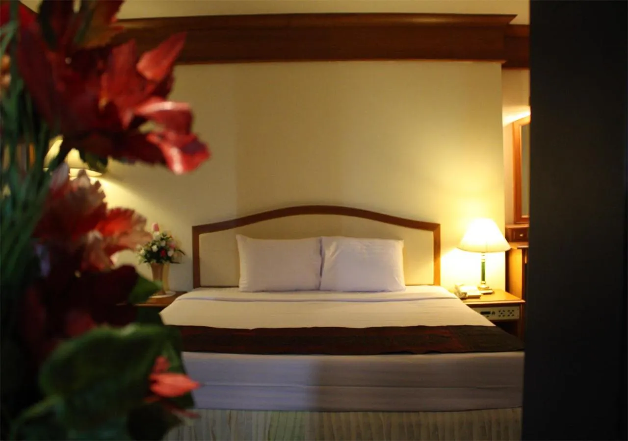 Bed in JP Emerald Hotel