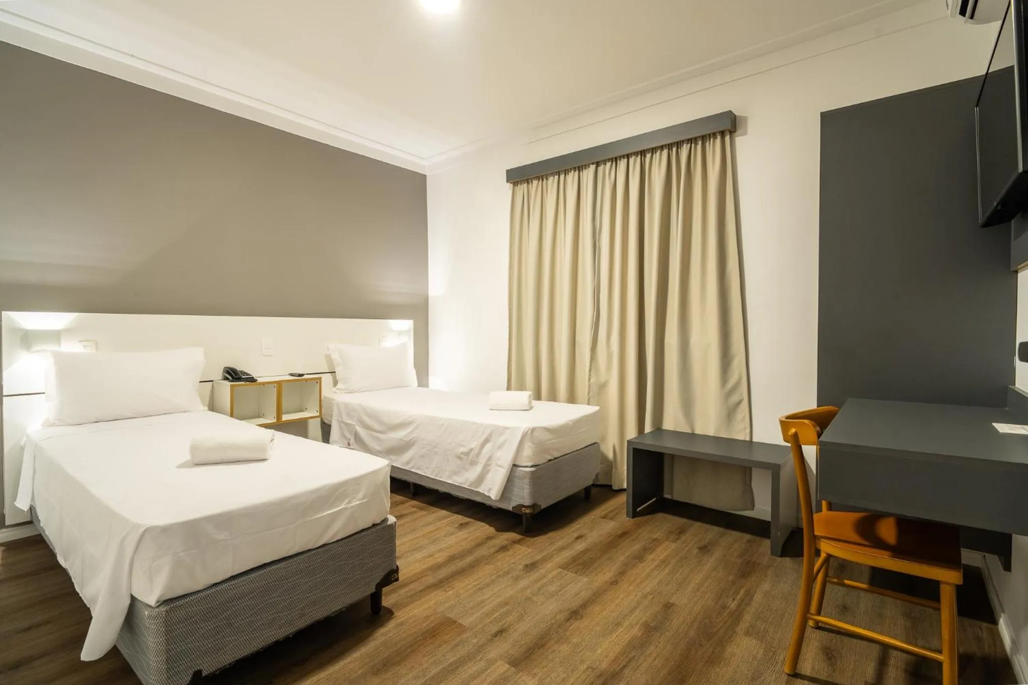 Bed in Uniclass Hotel Lapa