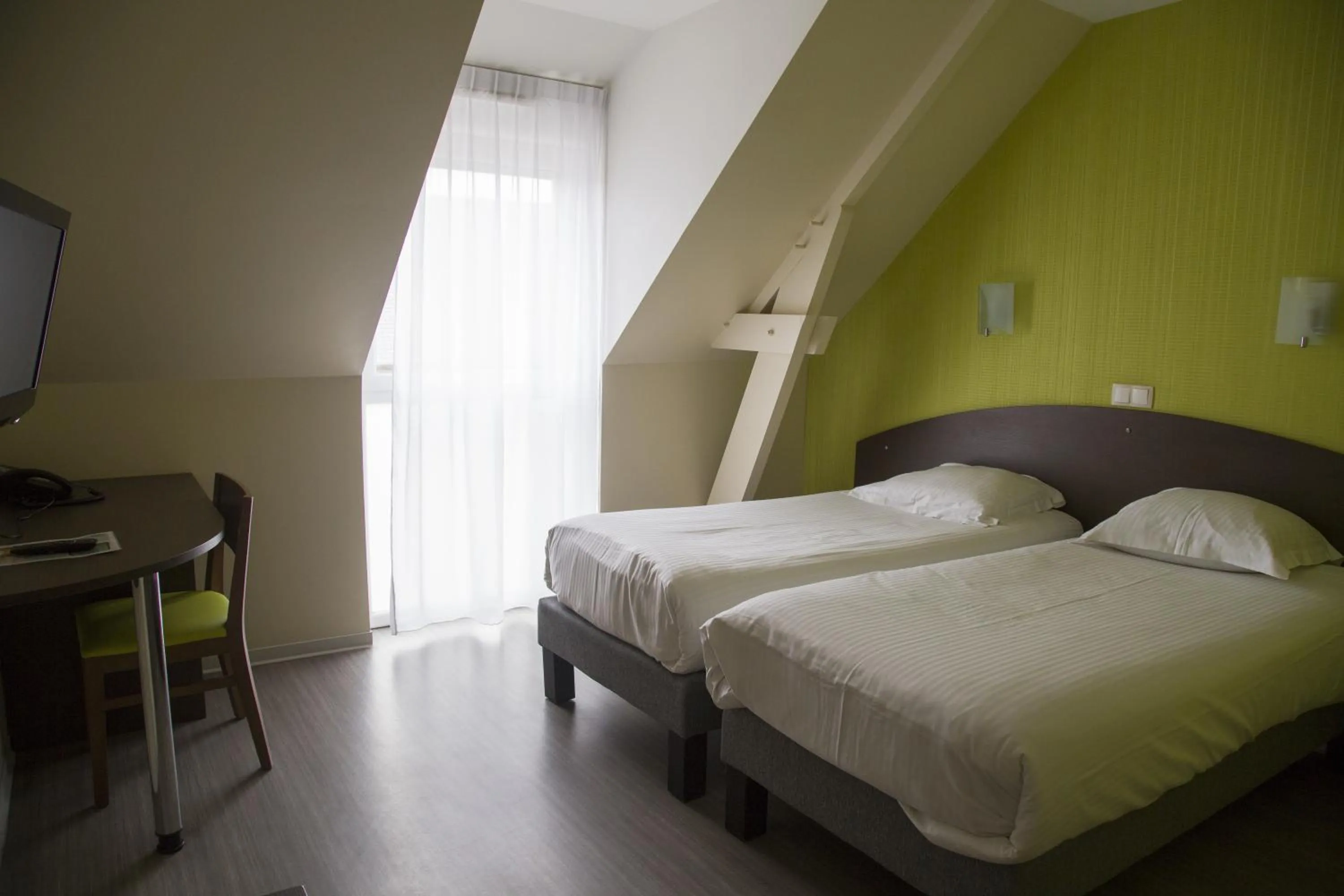 Bed in Auberge de la Baie