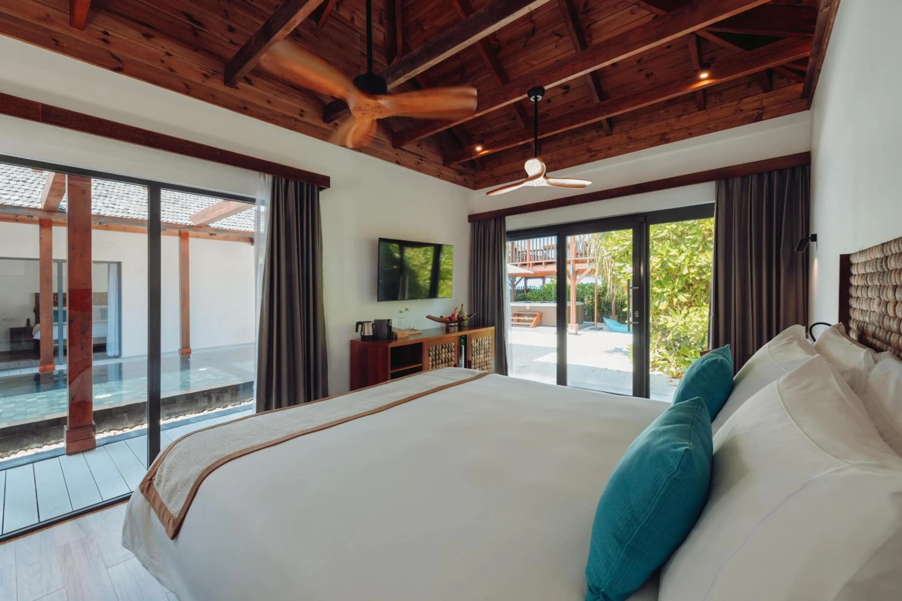 Bed in Kuredhivaru Resort and Spa - Maldives