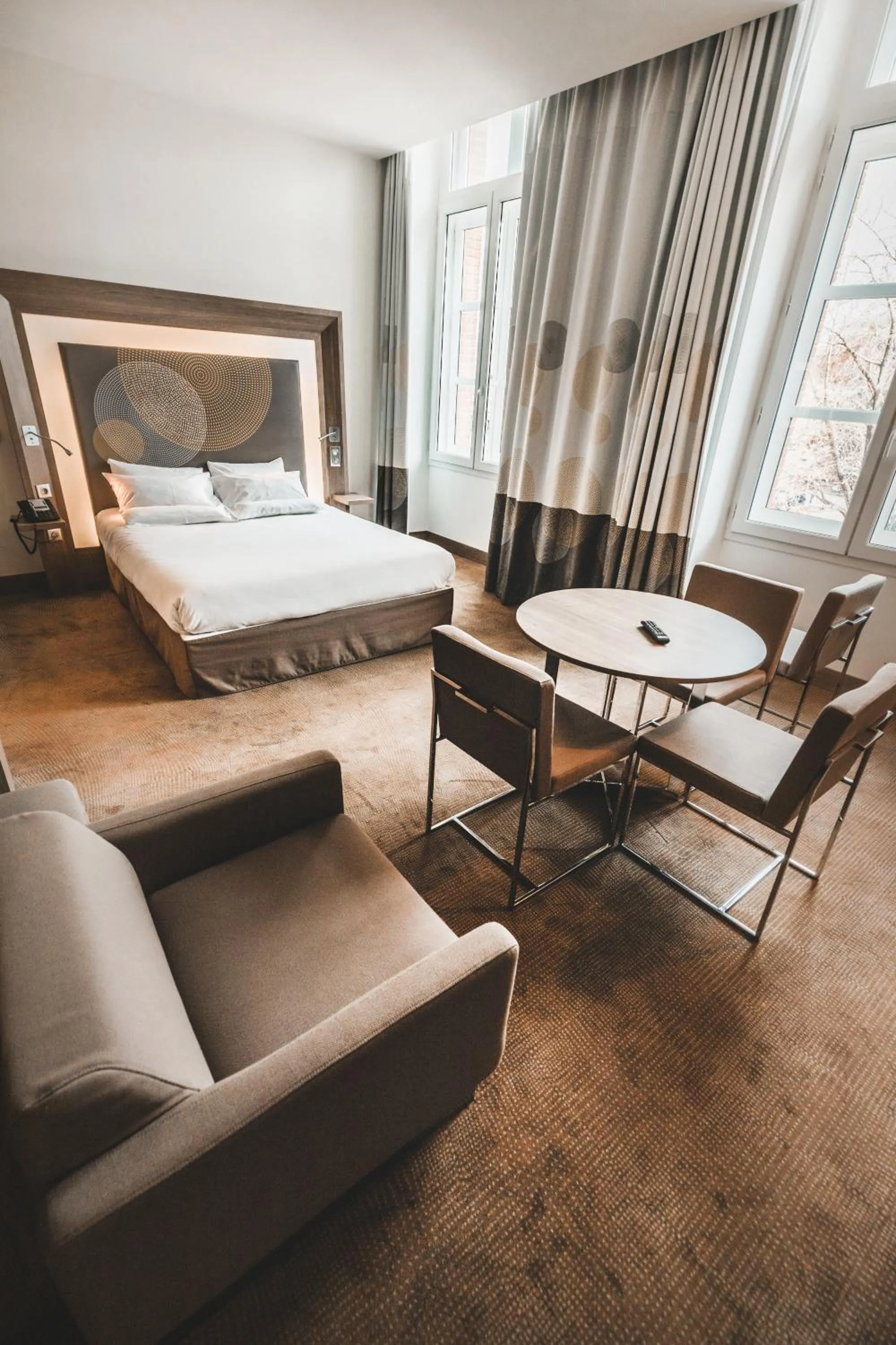 Bed in Novotel Toulouse Centre Wilson