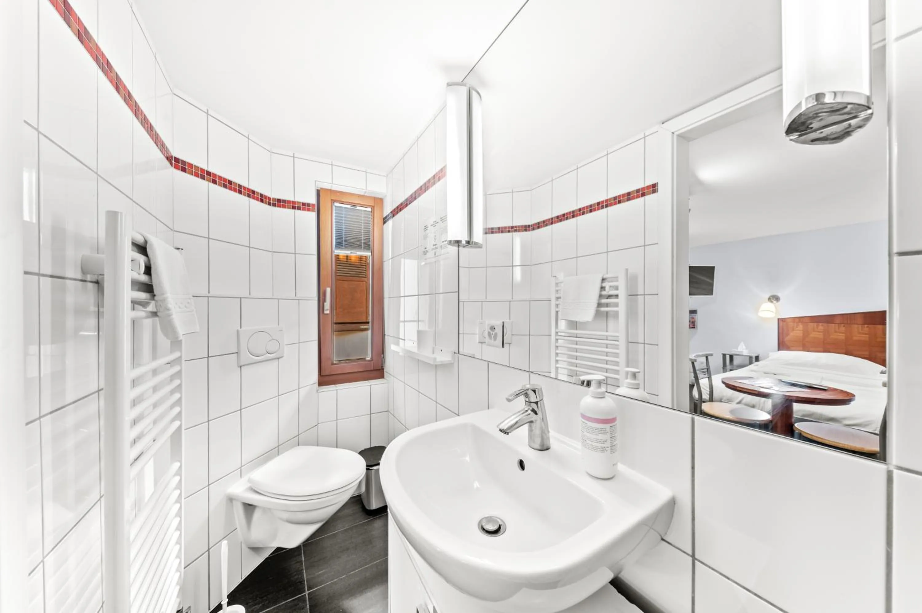 Bathroom in Hotel Hine Adon Fribourg