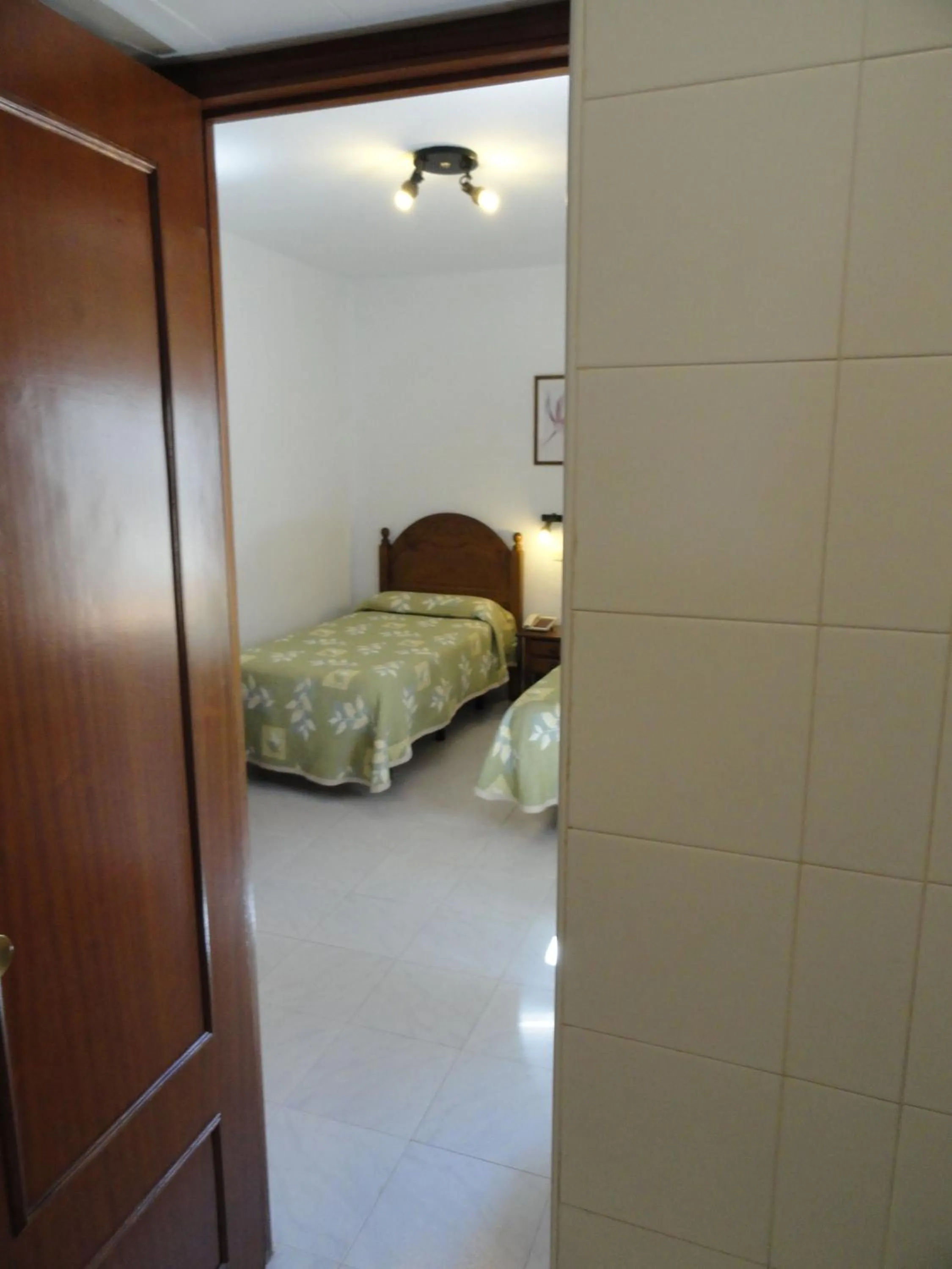 Bed in Hotel El Coloso