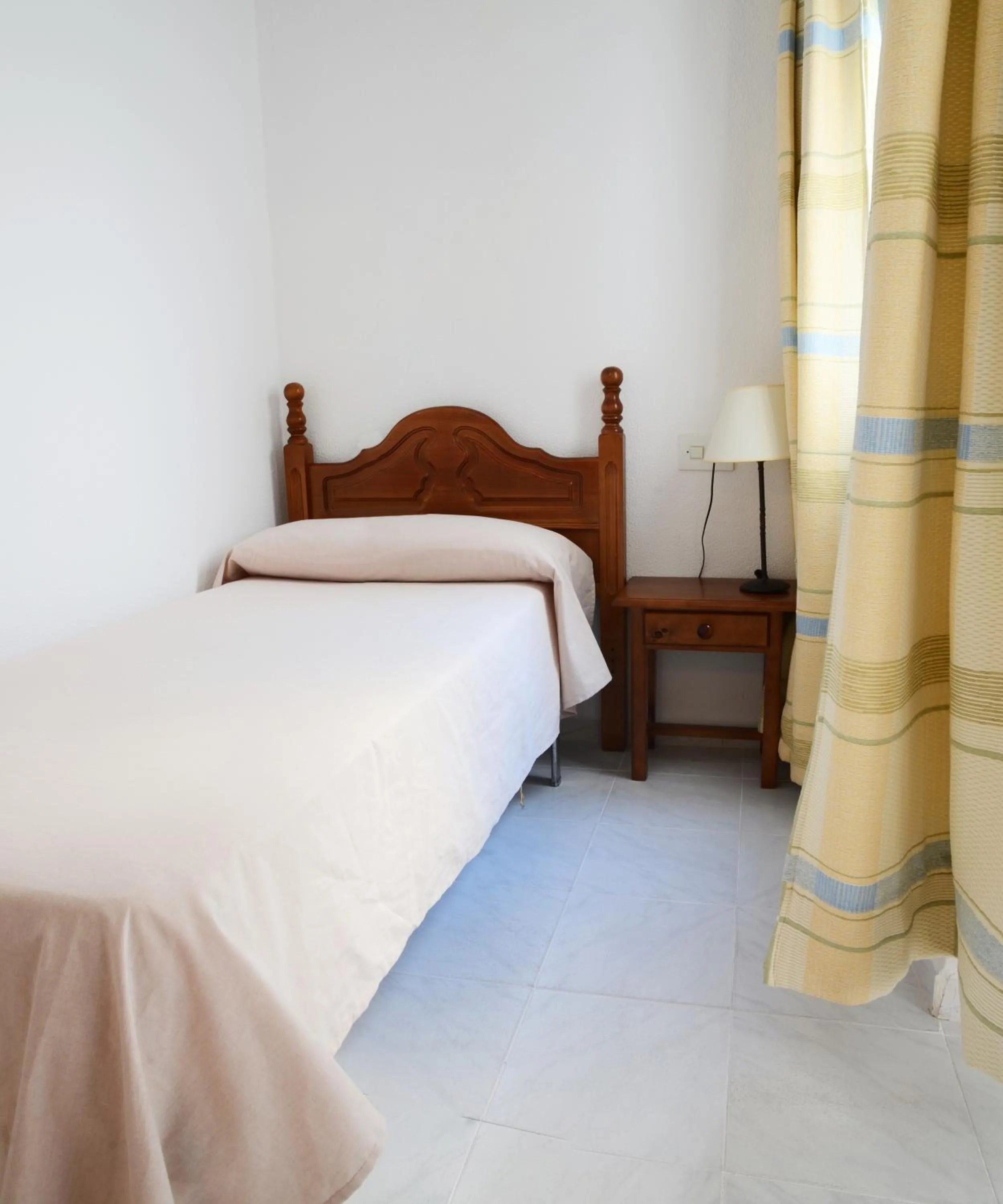 Bed in Hotel El Coloso